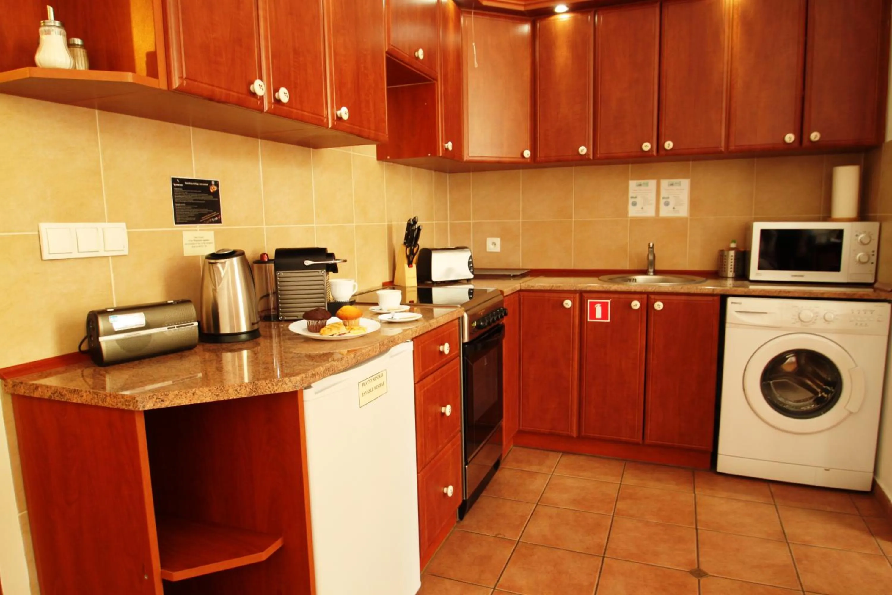 Kitchen or kitchenette in Ventus Rosa Self Service Apartments