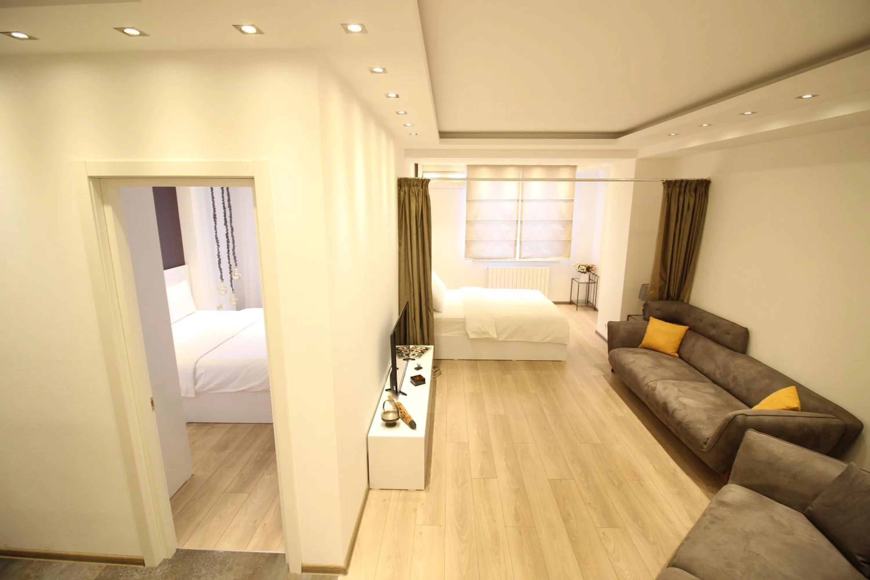 Living room, Bed in Super Luxury Apartments