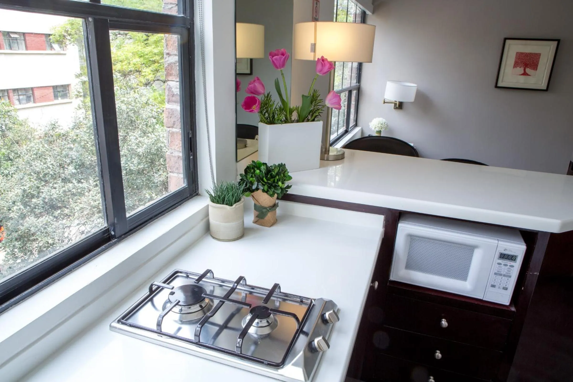 Kitchen or kitchenette in FlowSuites Polanco