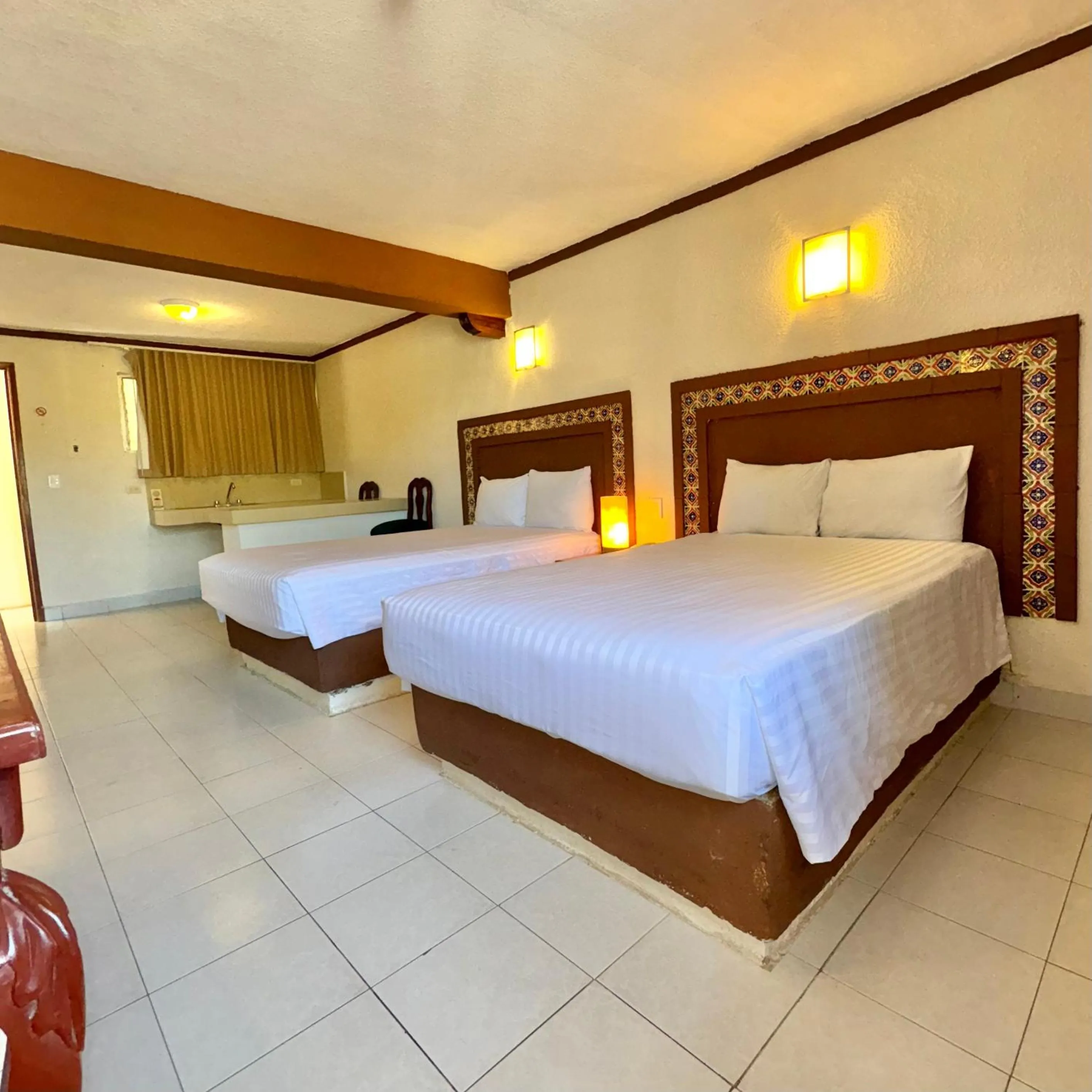 Bed in Suites Cancun Center