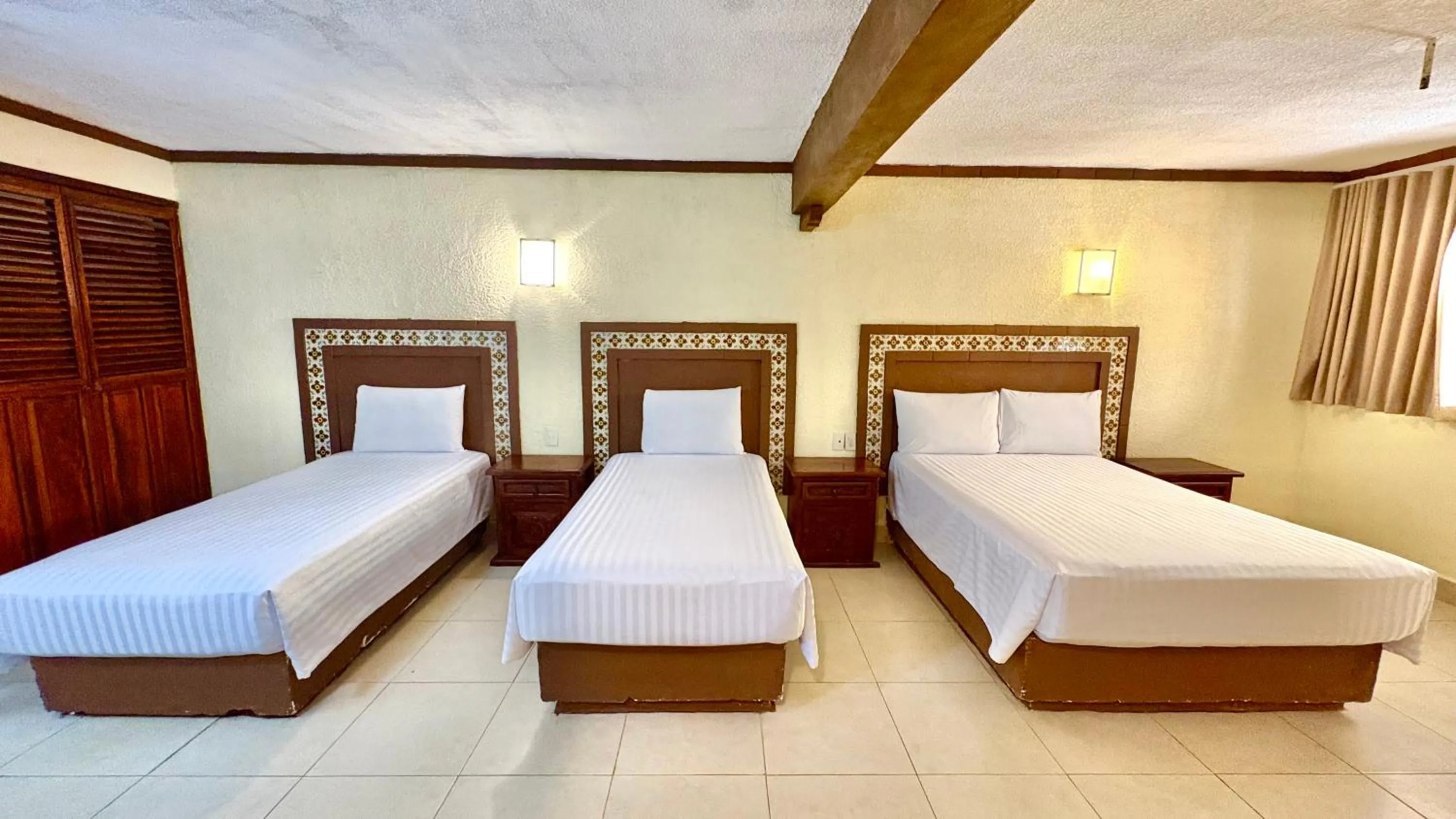 Bed in Suites Cancun Center