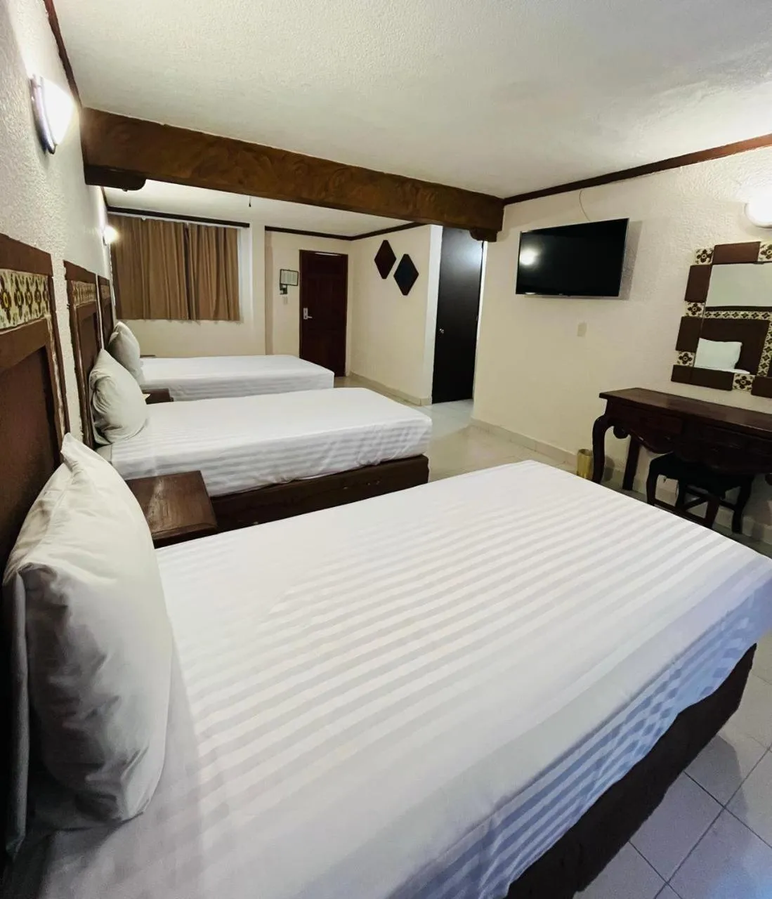 Bed in Suites Cancun Center