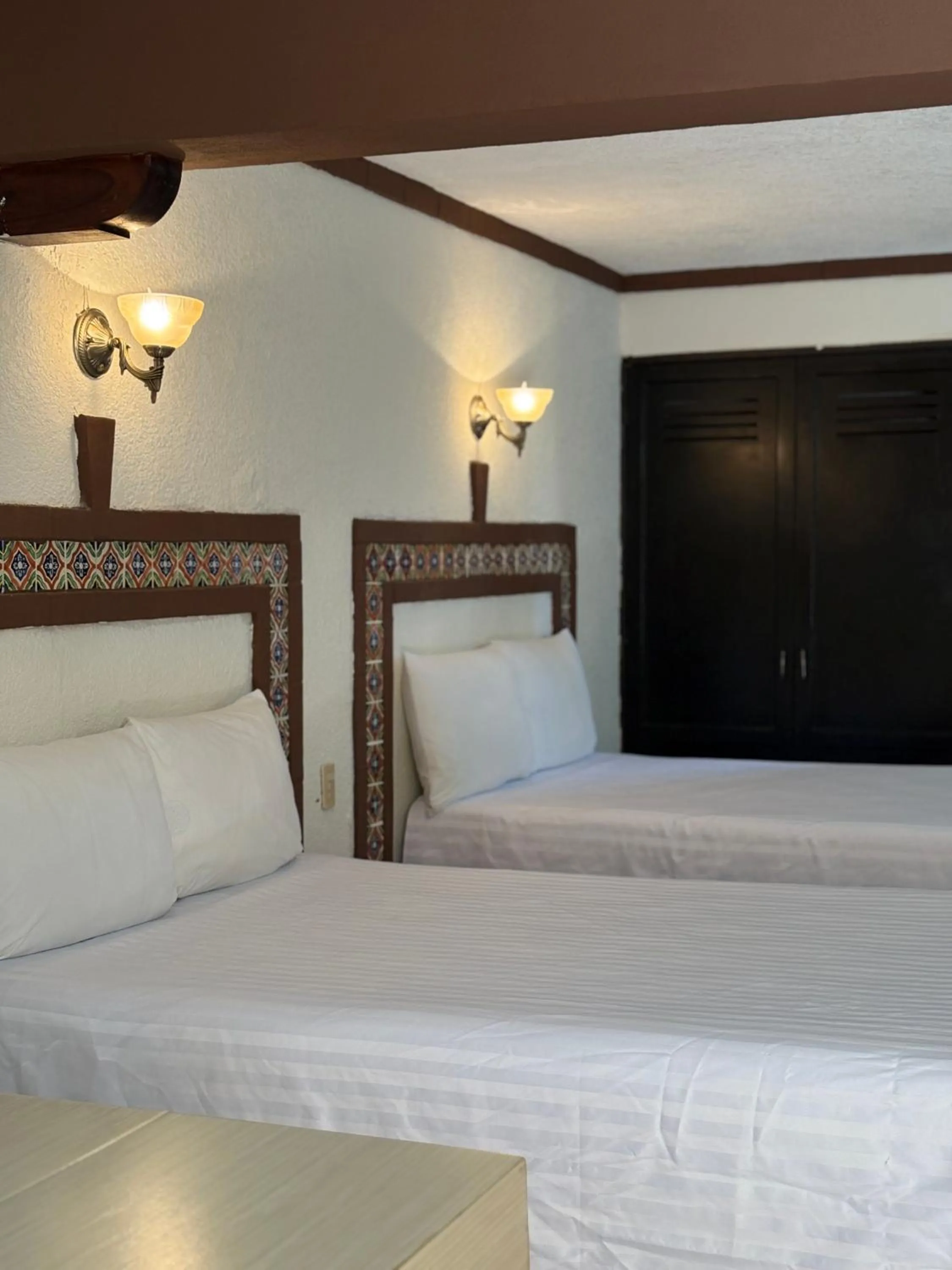 Bed in Suites Cancun Center