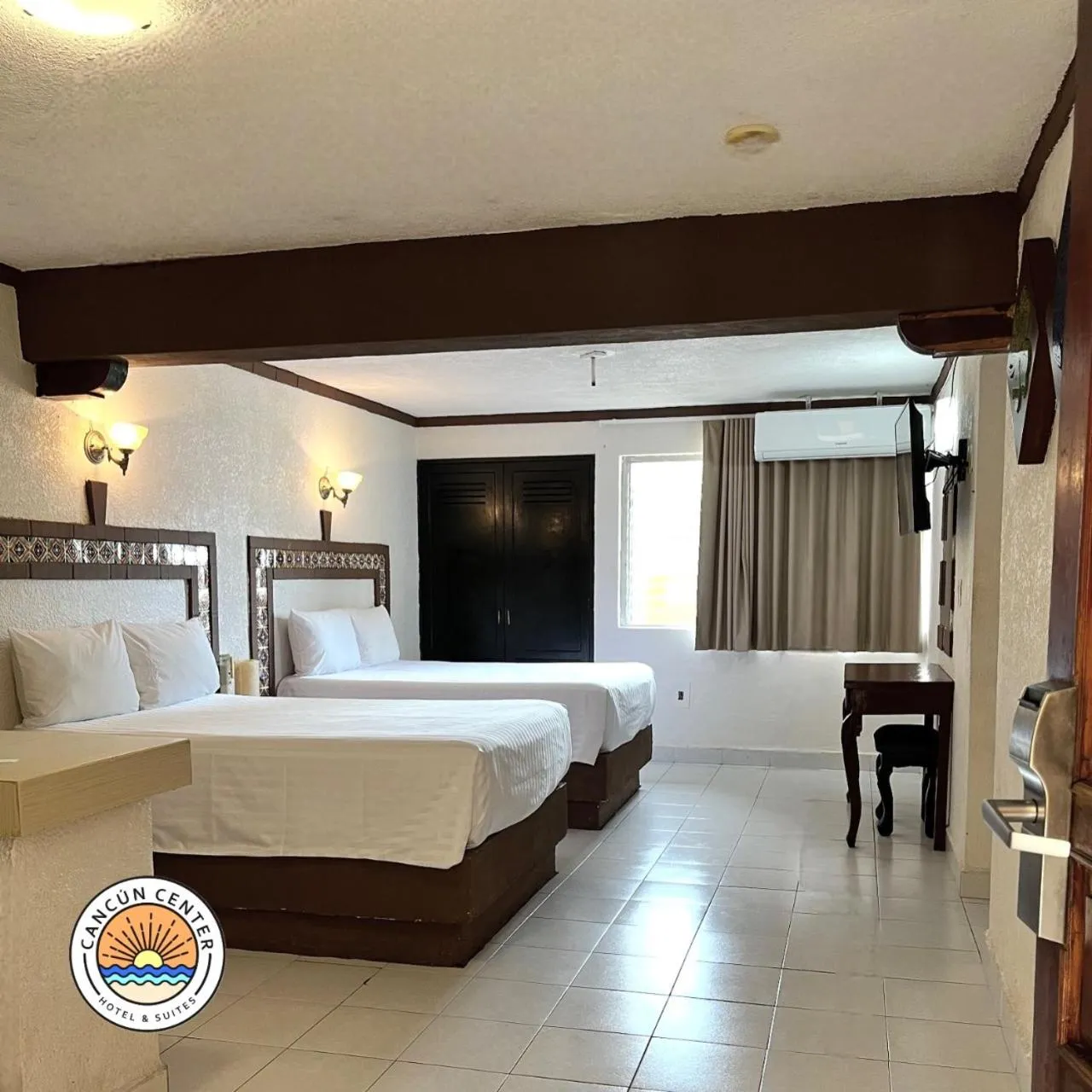 Bed in Suites Cancun Center