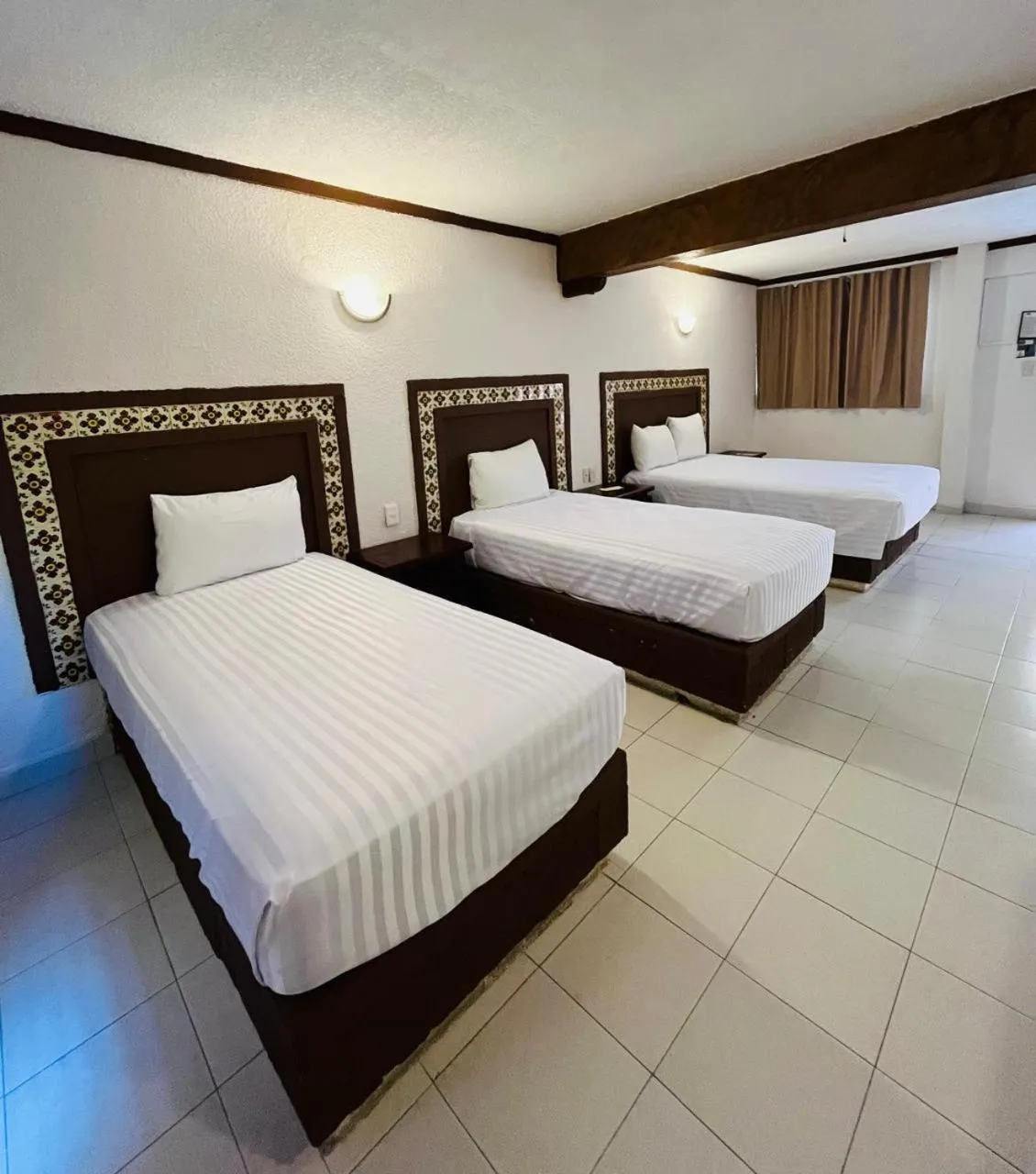 Bed in Suites Cancun Center