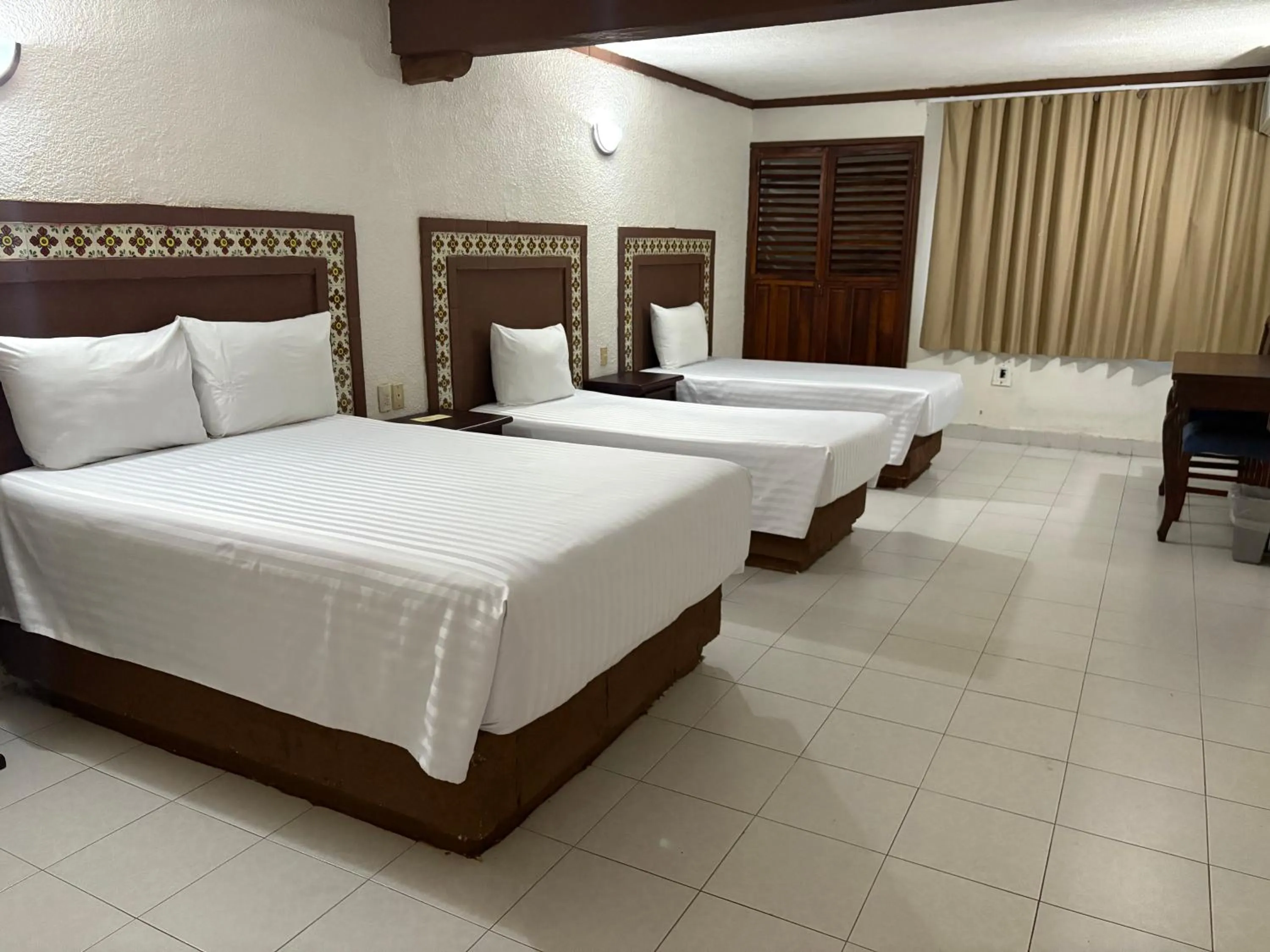 Bed in Suites Cancun Center