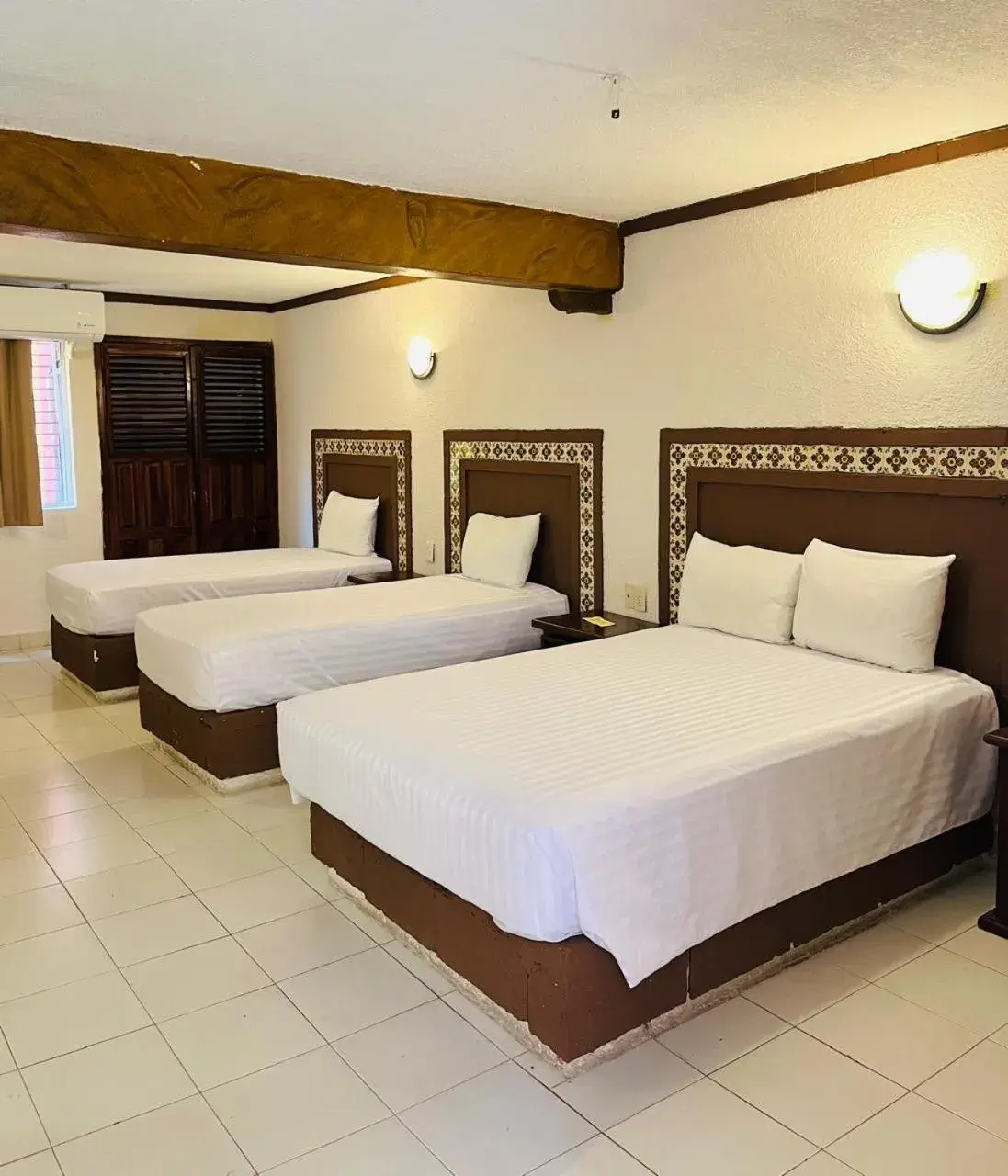 Triple Room in Suites Cancun Center Triple Room in Suites Cancun Center