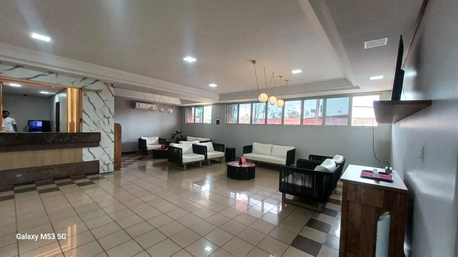 Lobby or reception in Victoria Plaza Hotel