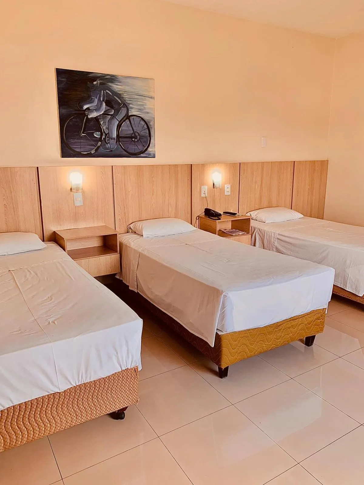 Bed in Victoria Plaza Hotel