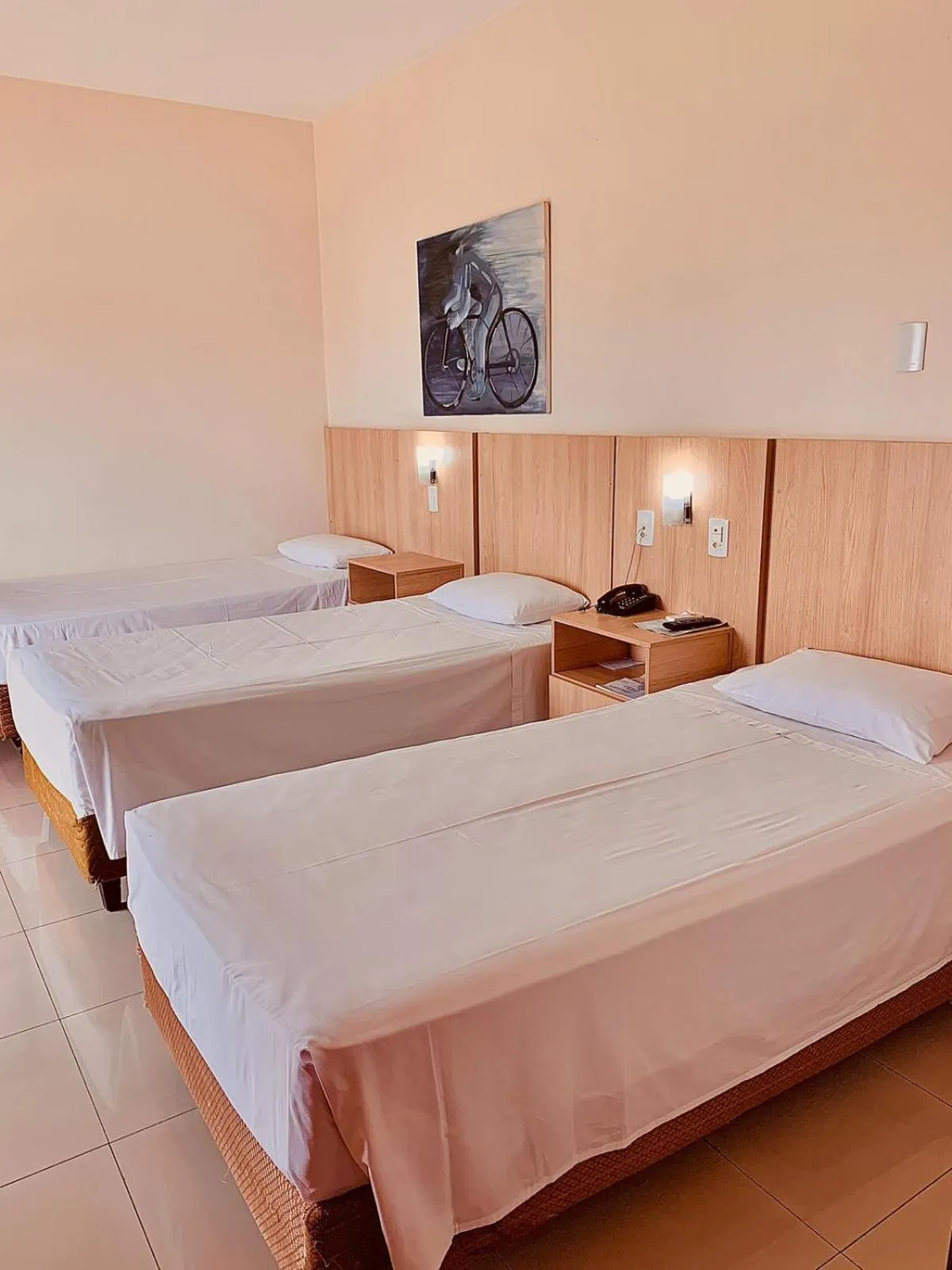 Bed in Victoria Plaza Hotel