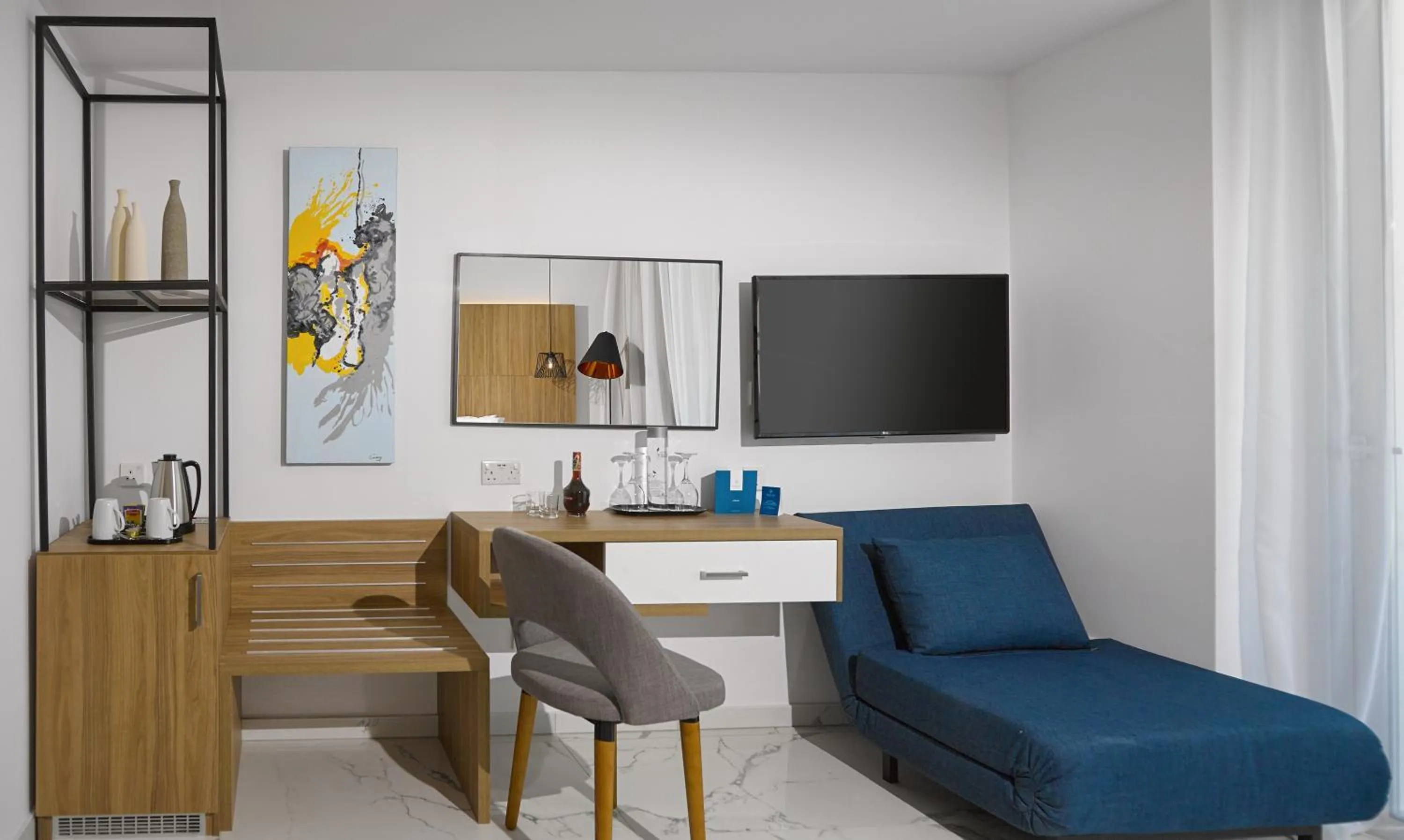 Bedroom in The Blue Ivy Hotel & Suites