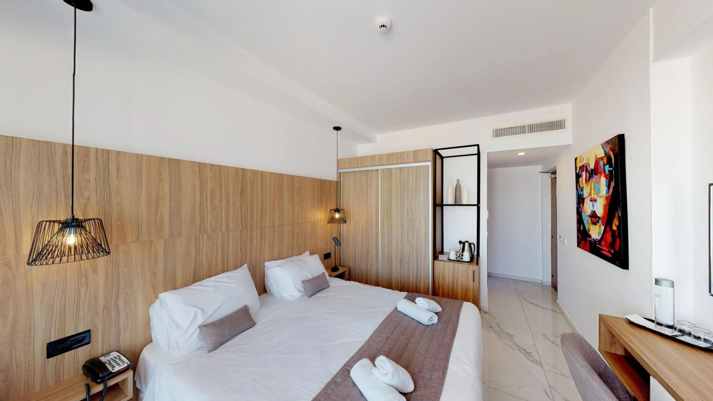 Bedroom, Bed in The Blue Ivy Hotel & Suites