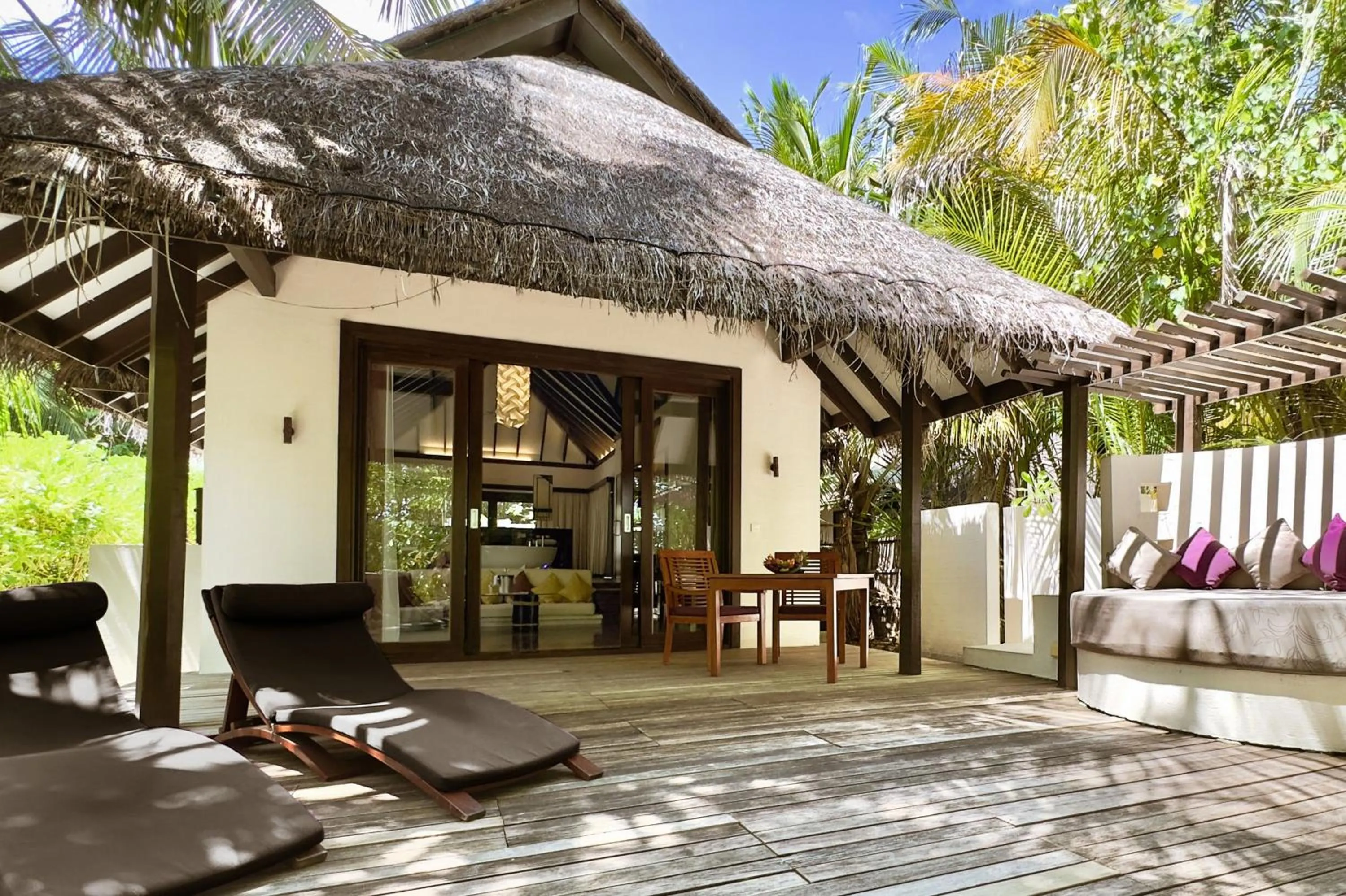 Patio in Coco Bodu Hithi - 50 percent off shared roundtrip Speedboat for stays from 1 Sep to 23 Dec 2025
