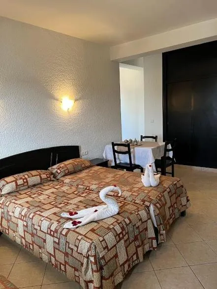 Bed in Studiotel Afoud