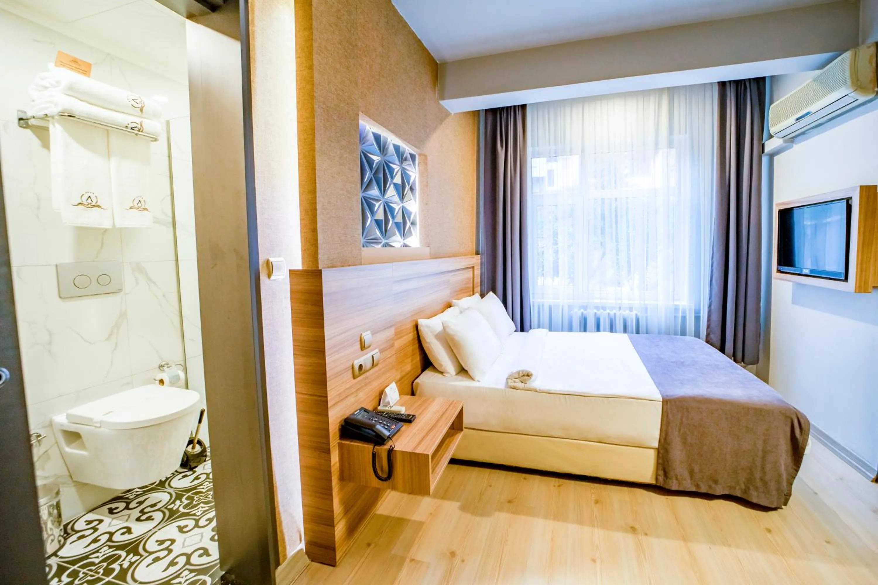 Bed in Aksular Hotel