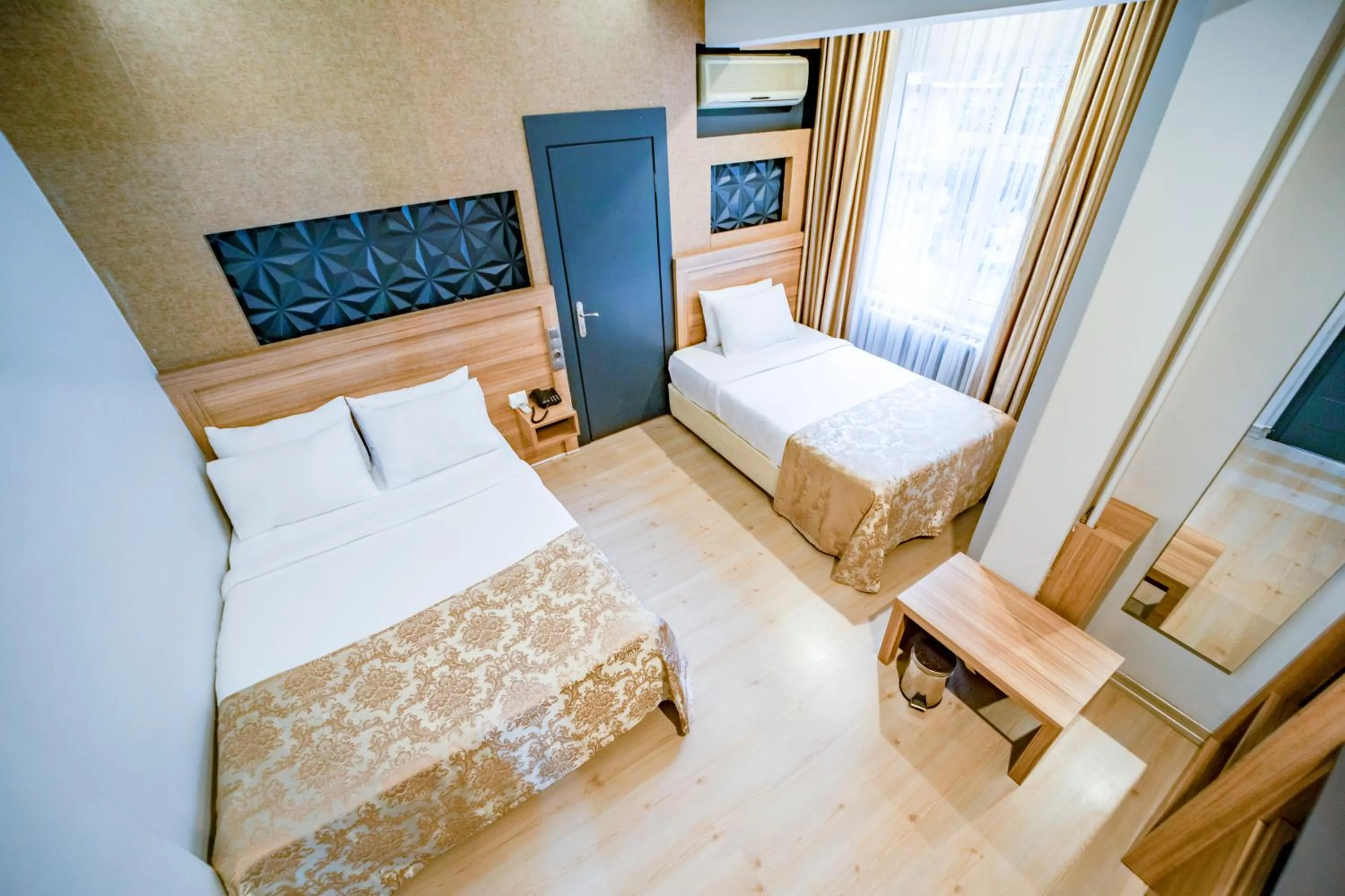 Bed in Aksular Hotel