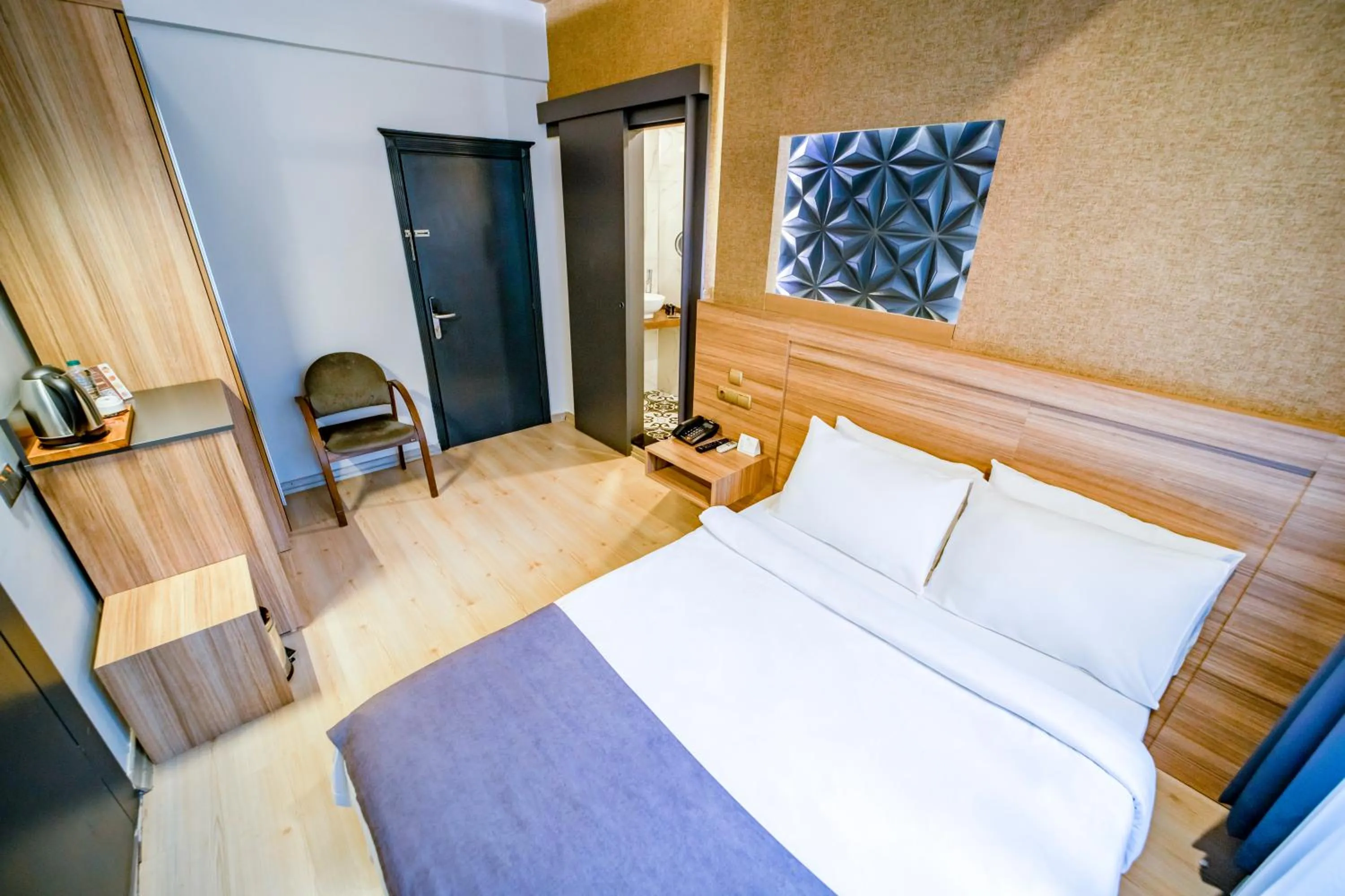 Bed in Aksular Hotel