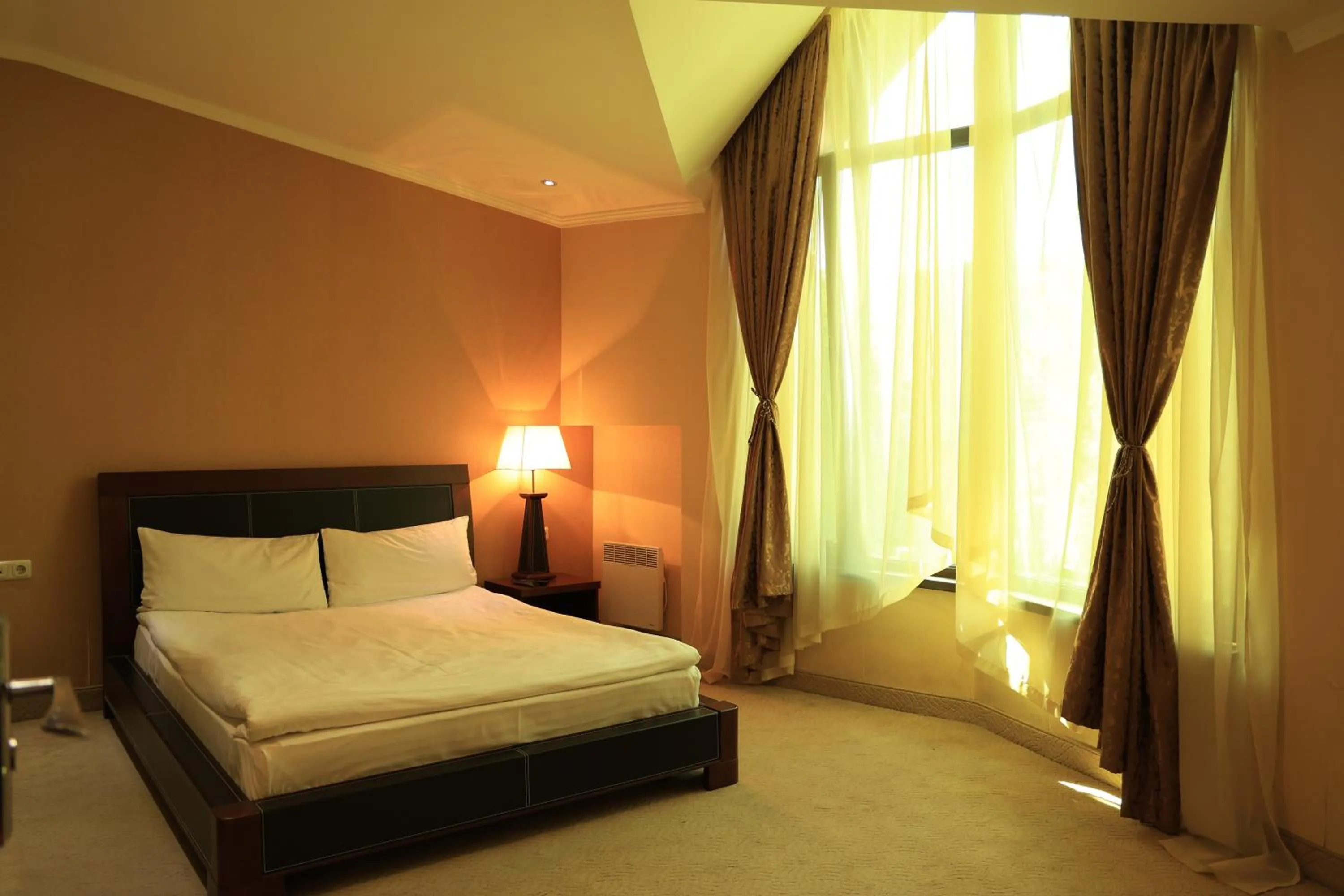 Bed in Dilijan Park Resort & Villas