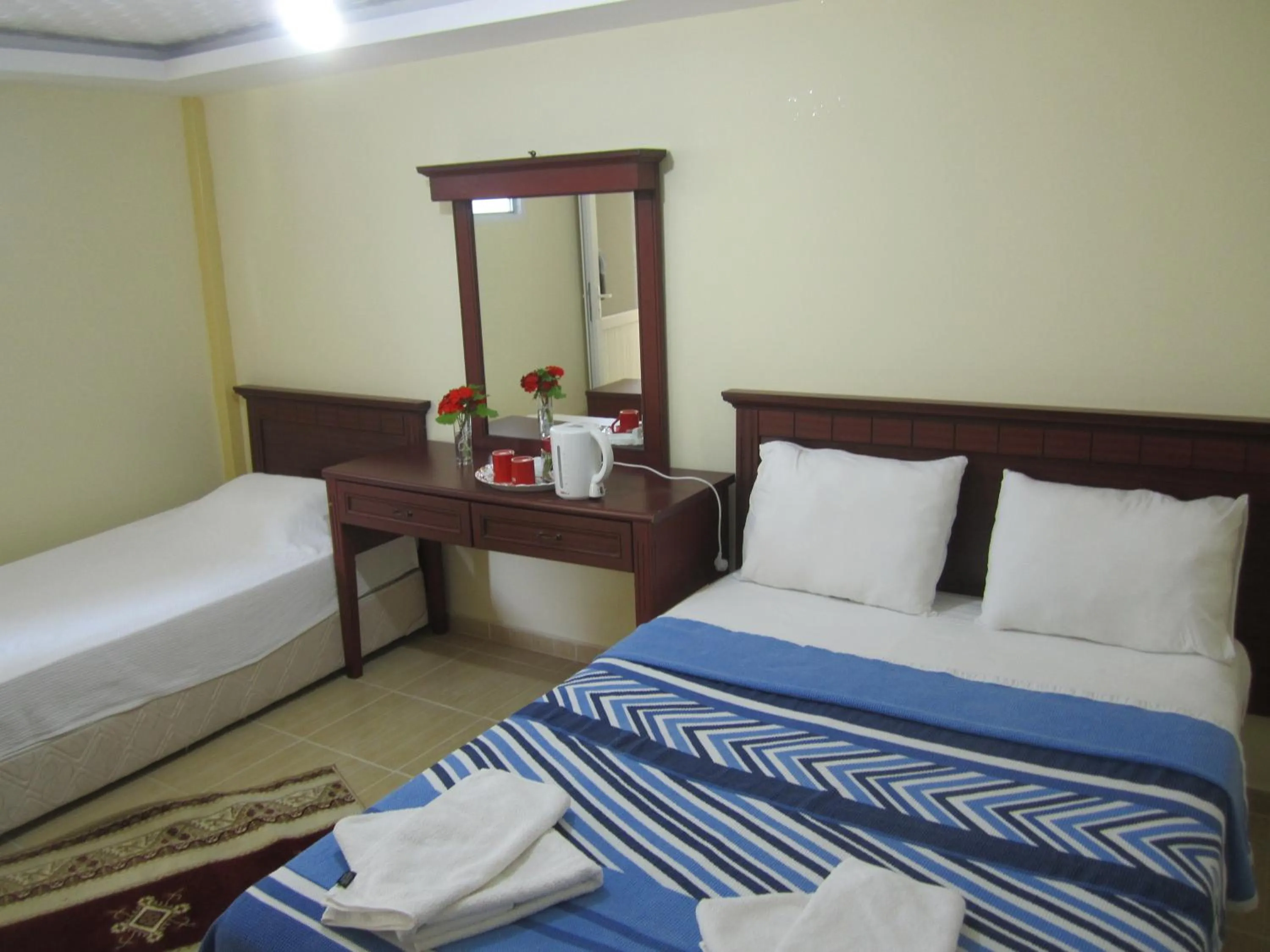 Bed in Arikanda River Garden Hotel