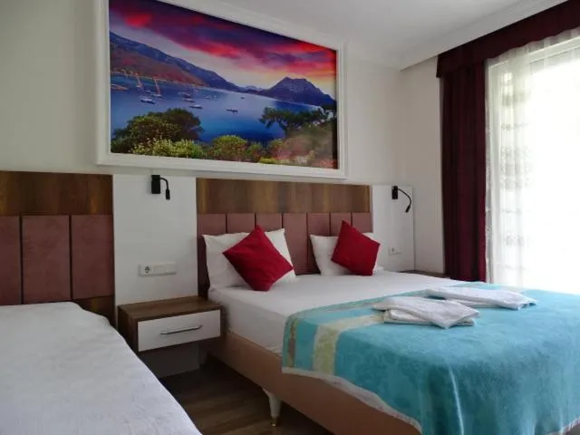 Bed in Arikanda River Garden Hotel