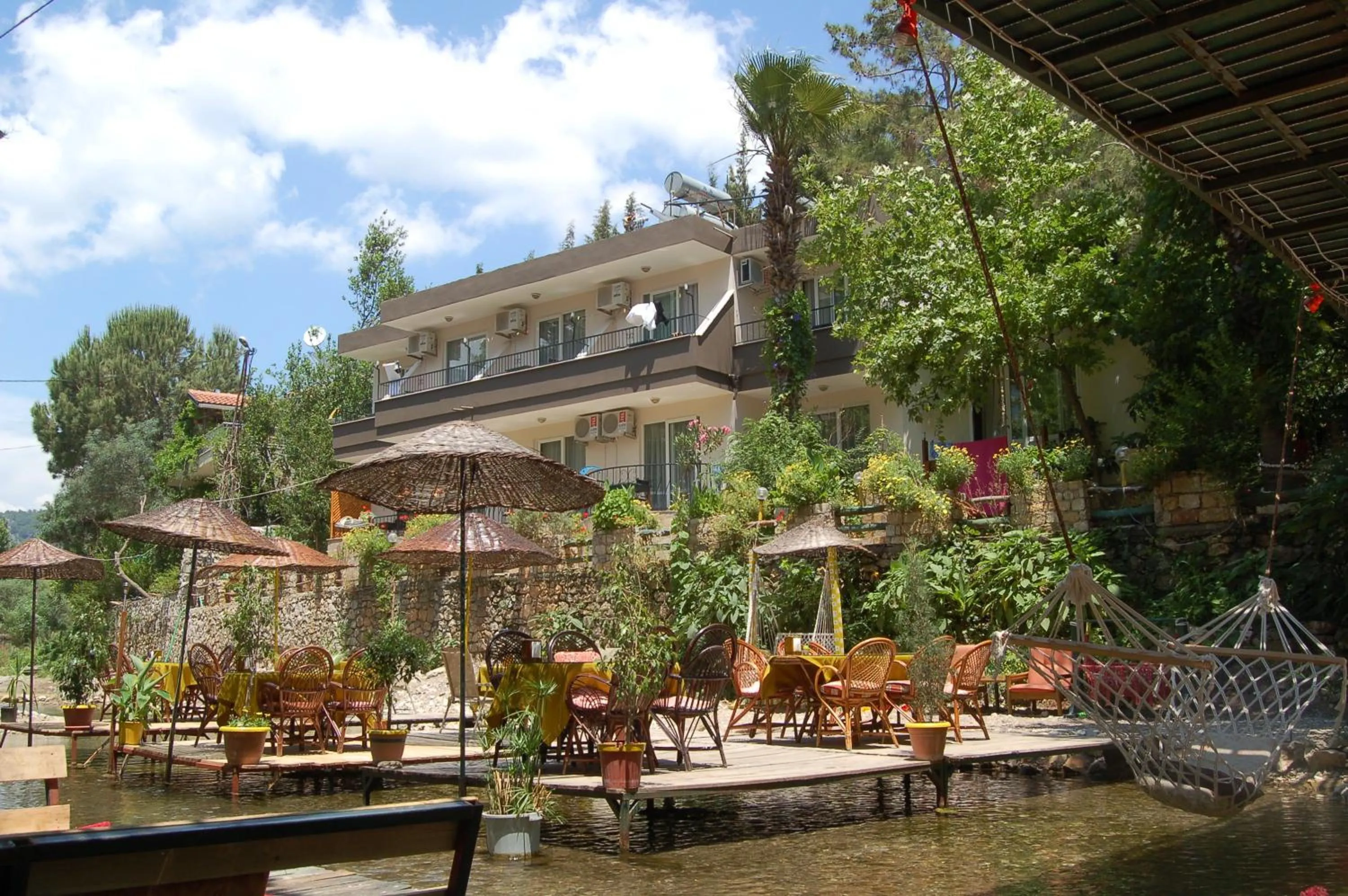 Dining area in Arikanda River Garden Hotel