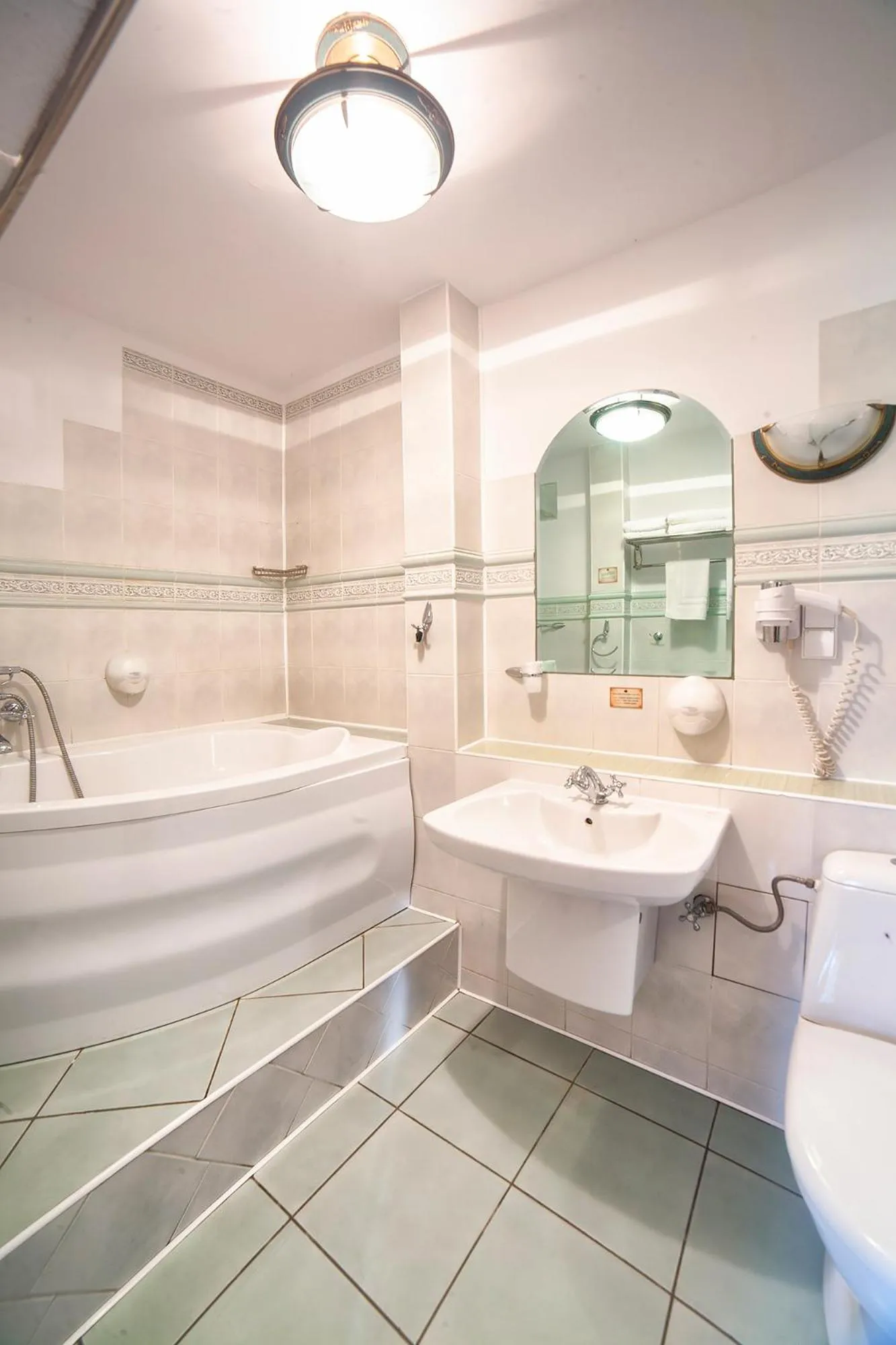 Bathroom in Hotel Dworek Wapionka