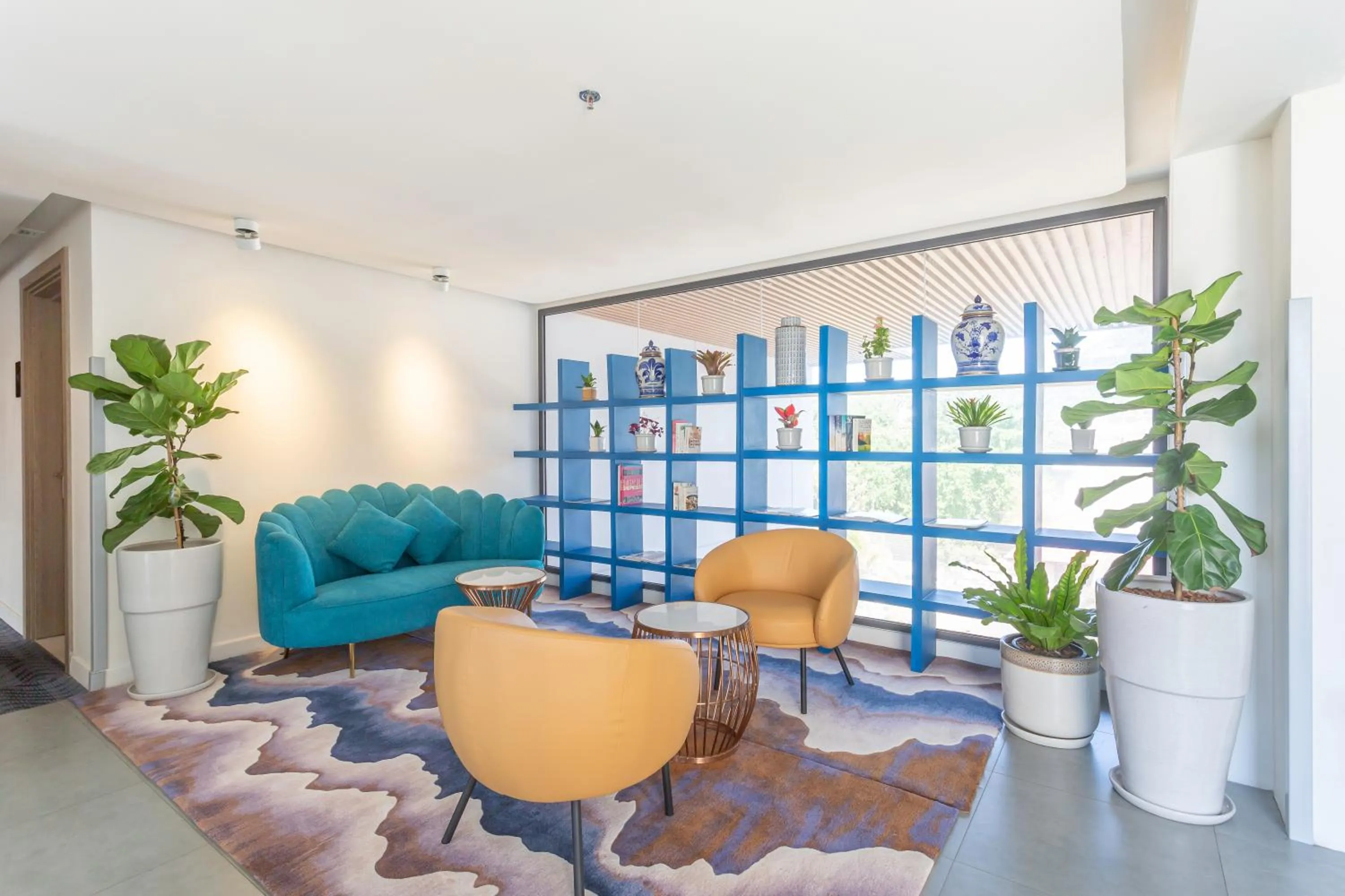 Seating area in Hotel Clover Patong Phuket - SHA Plus