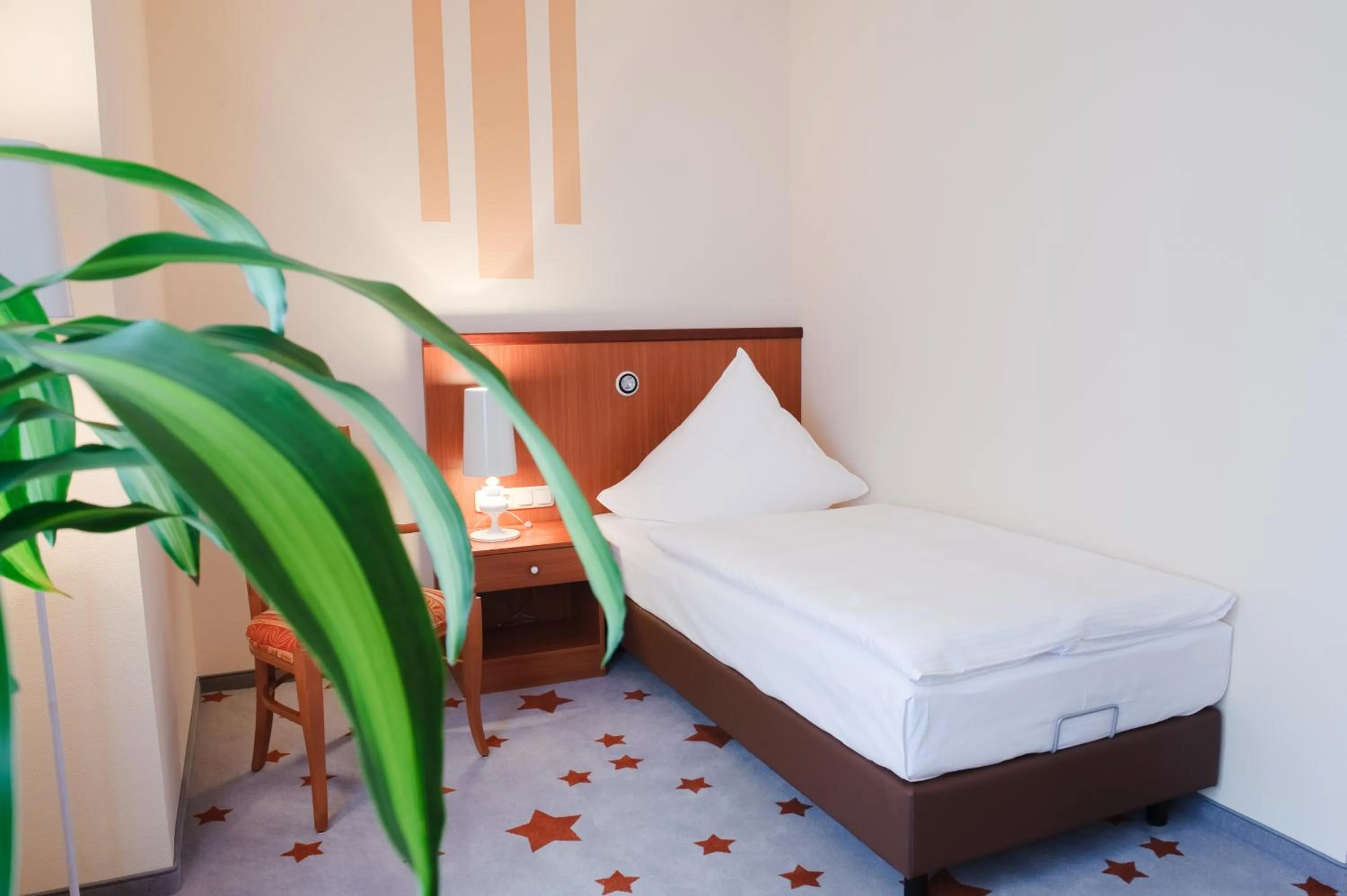 Photo of the whole room, Bed in Stadthotel Stern