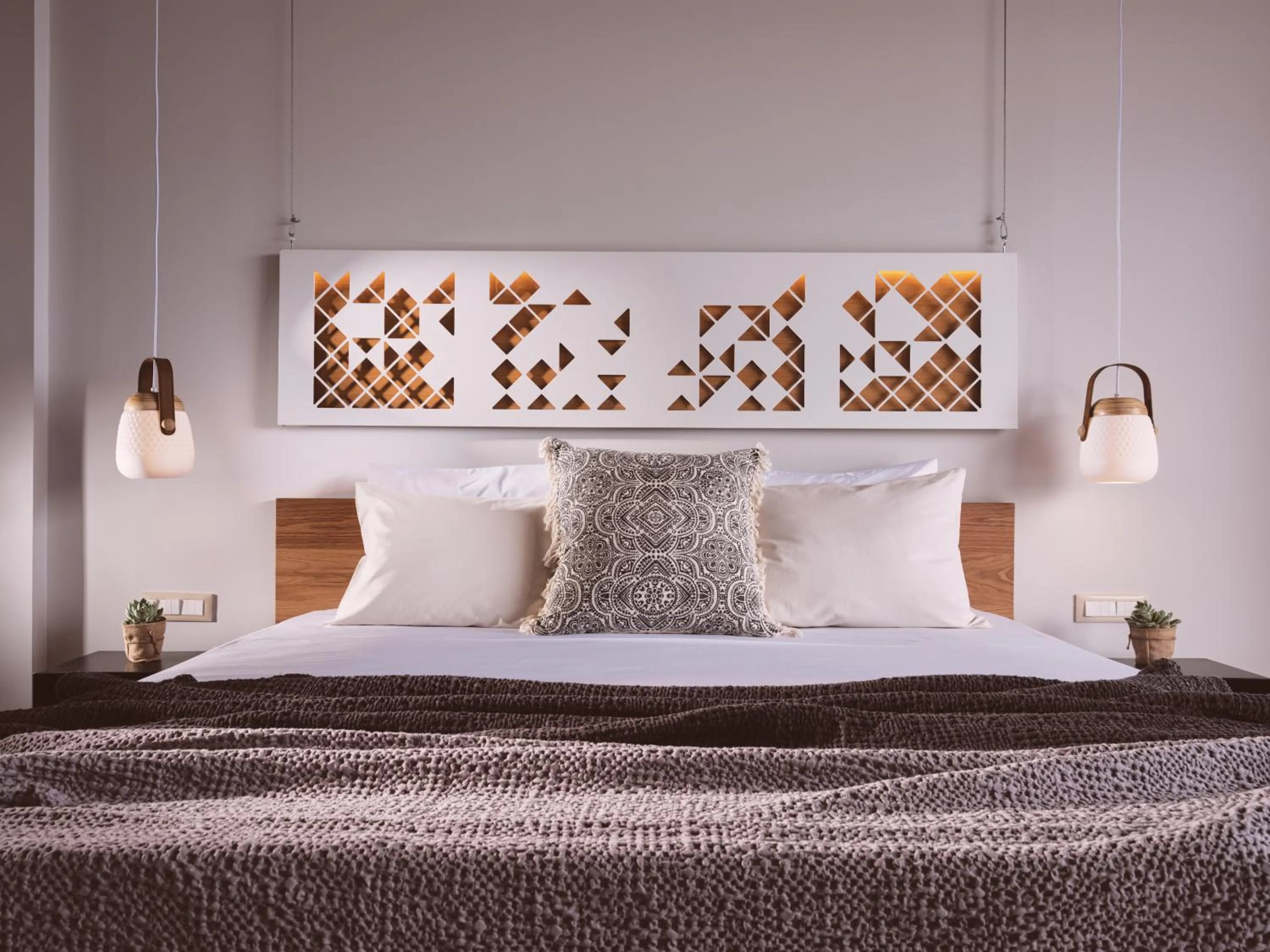 Bed in Hotel St.John Suites Adults Only