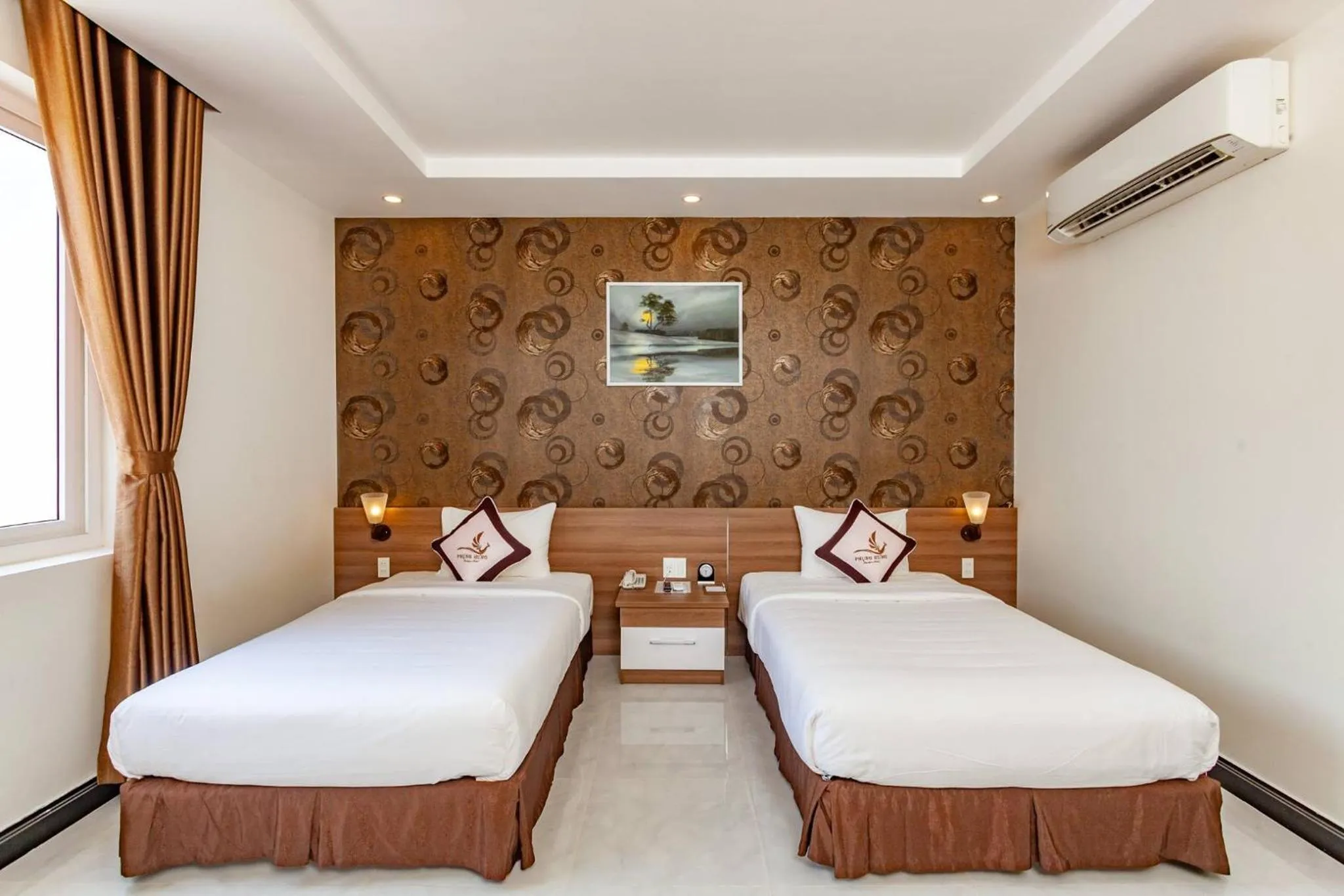 Bed in Phung Hung Boutique Hotel