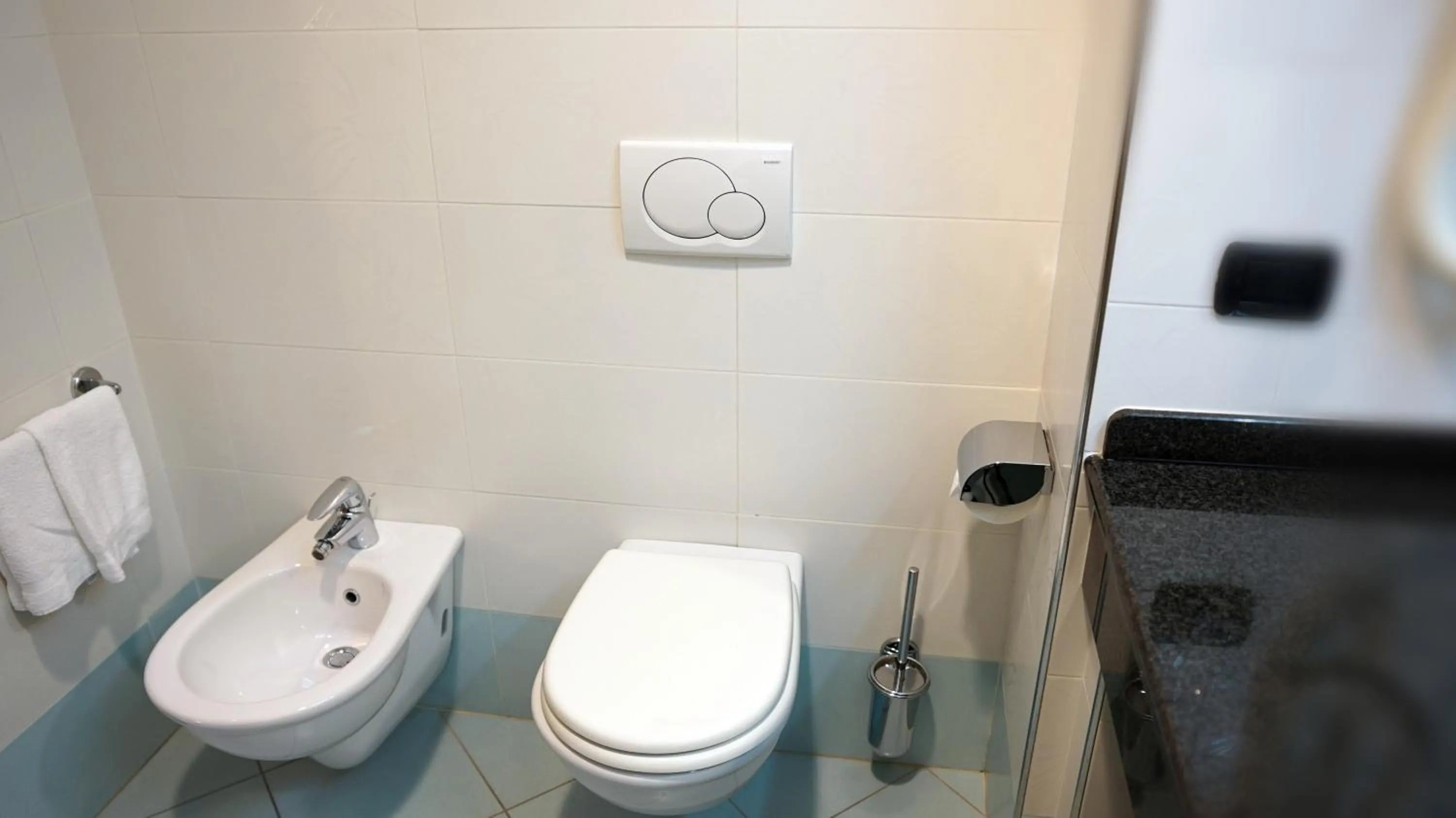 Toilet in Garden Hotel