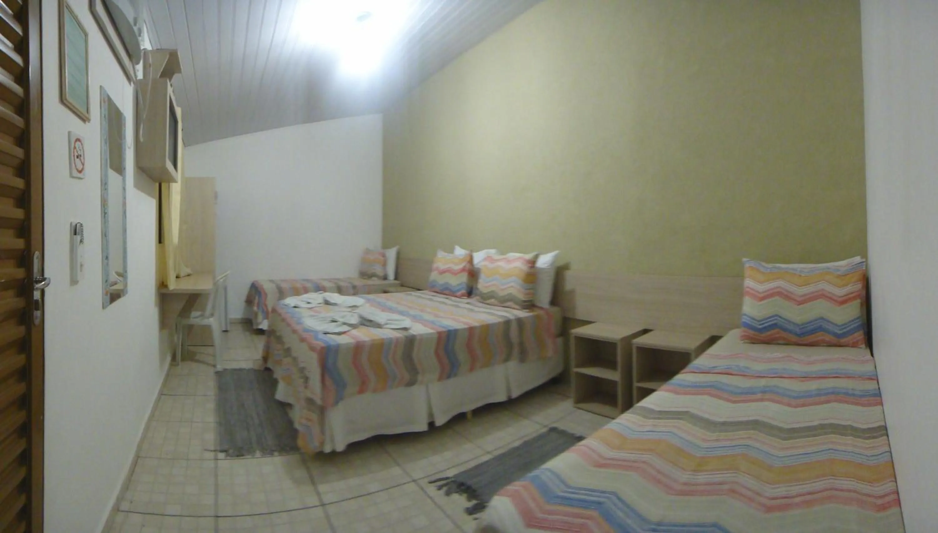 Photo of the whole room, Bed in Pousada Jubaia