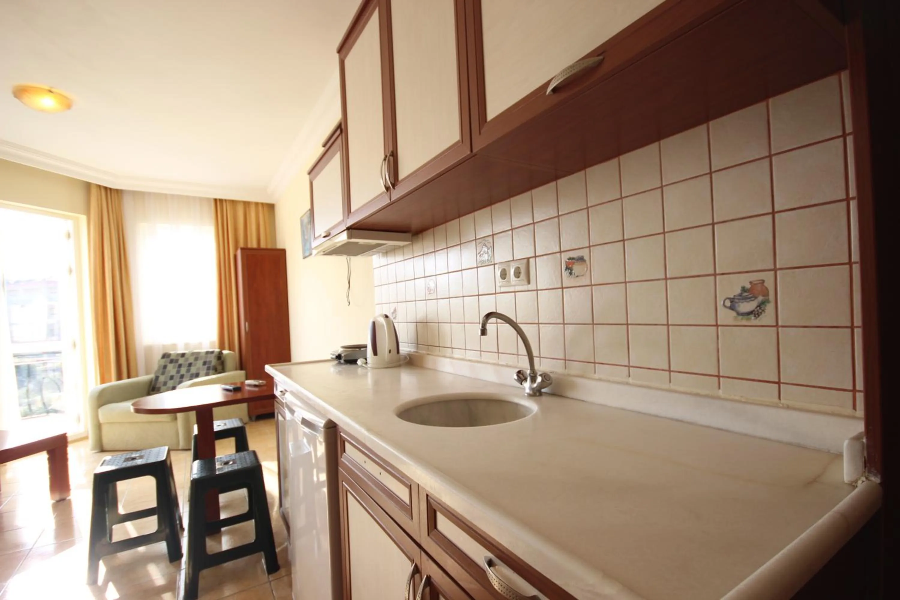 Kitchen or kitchenette in Minta Apart Hotel