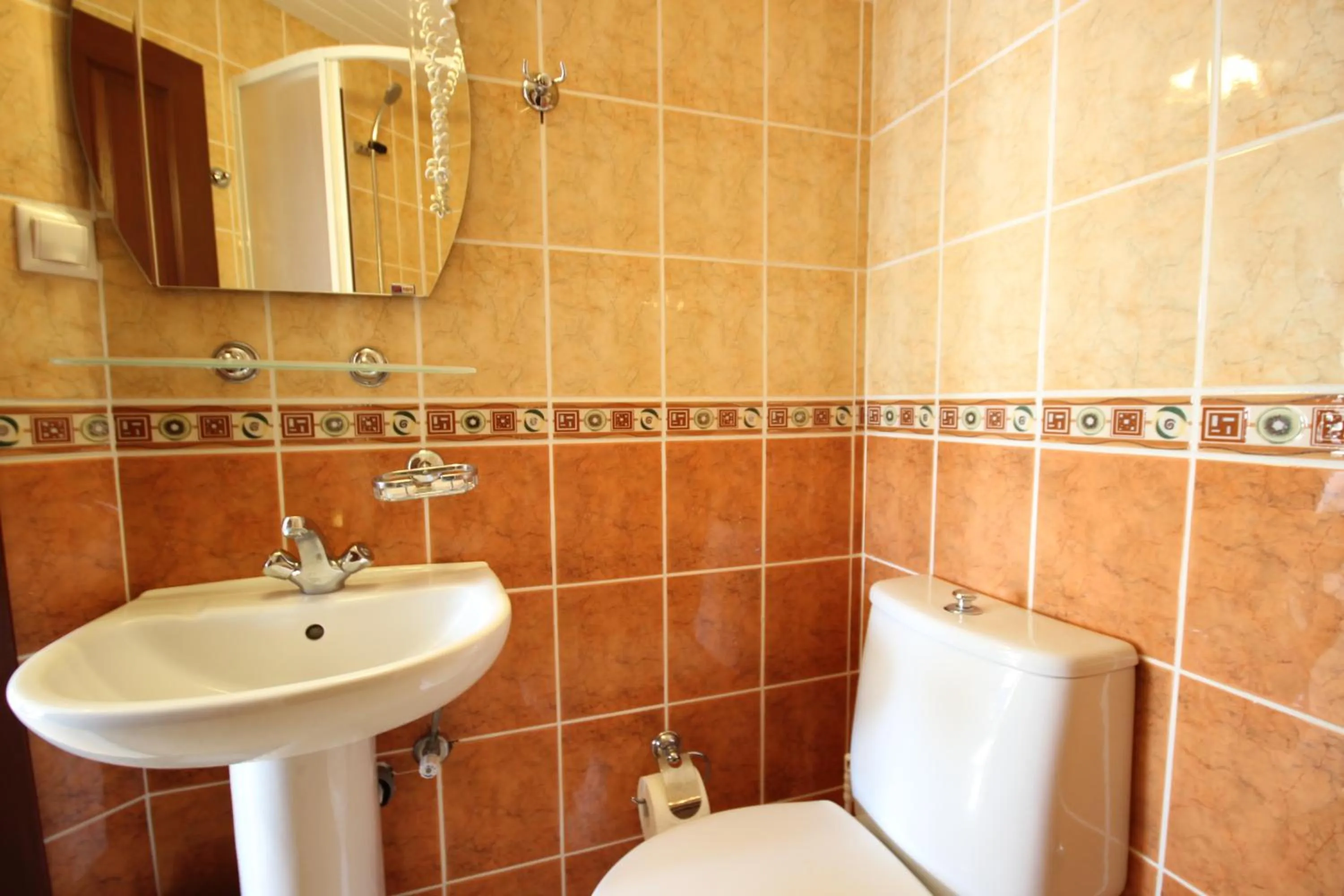 Toilet in Minta Apart Hotel