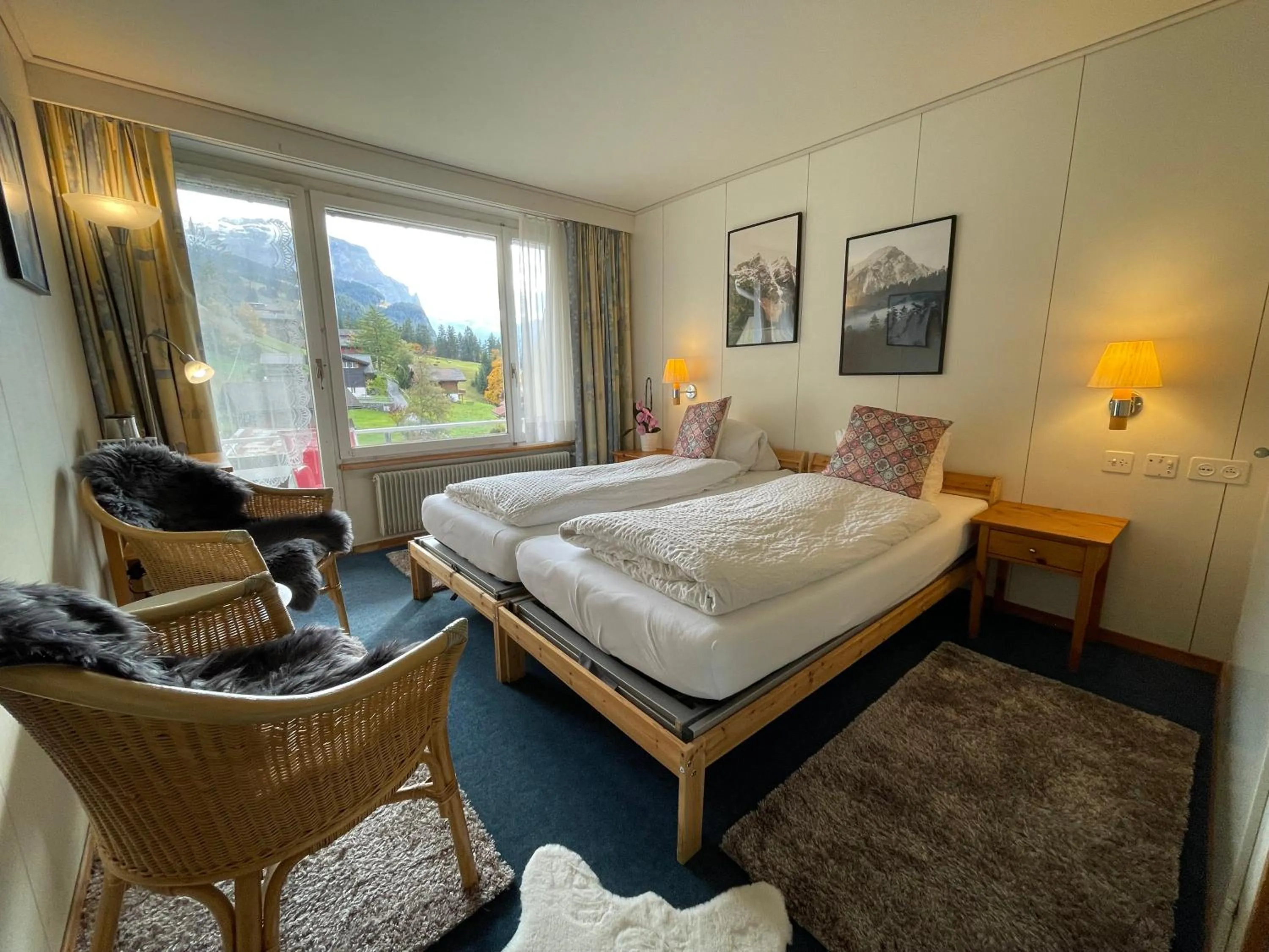 Bed in Guest Rooms with a great view at Residence Brunner