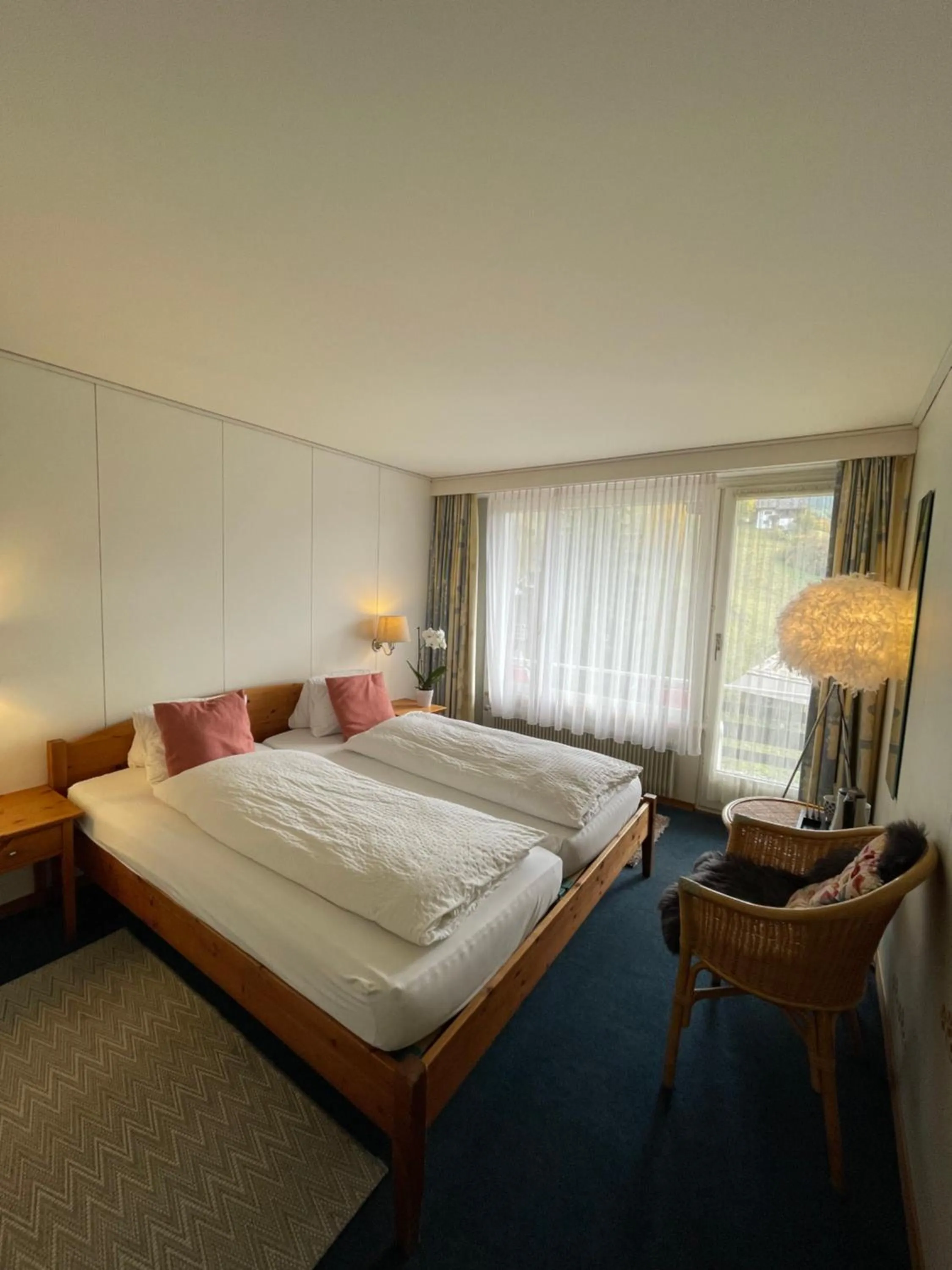 Bed in Guest Rooms with a great view at Residence Brunner