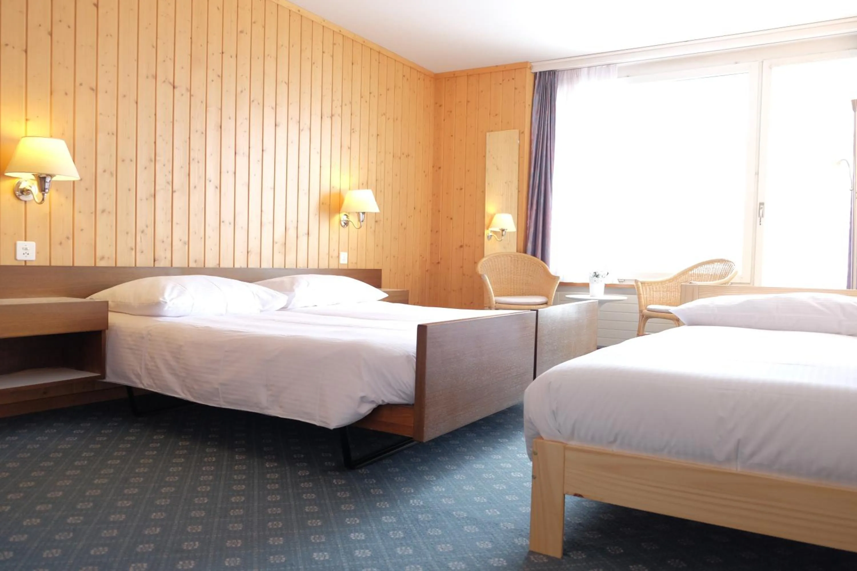 Bed in Guest Rooms with a great view at Residence Brunner