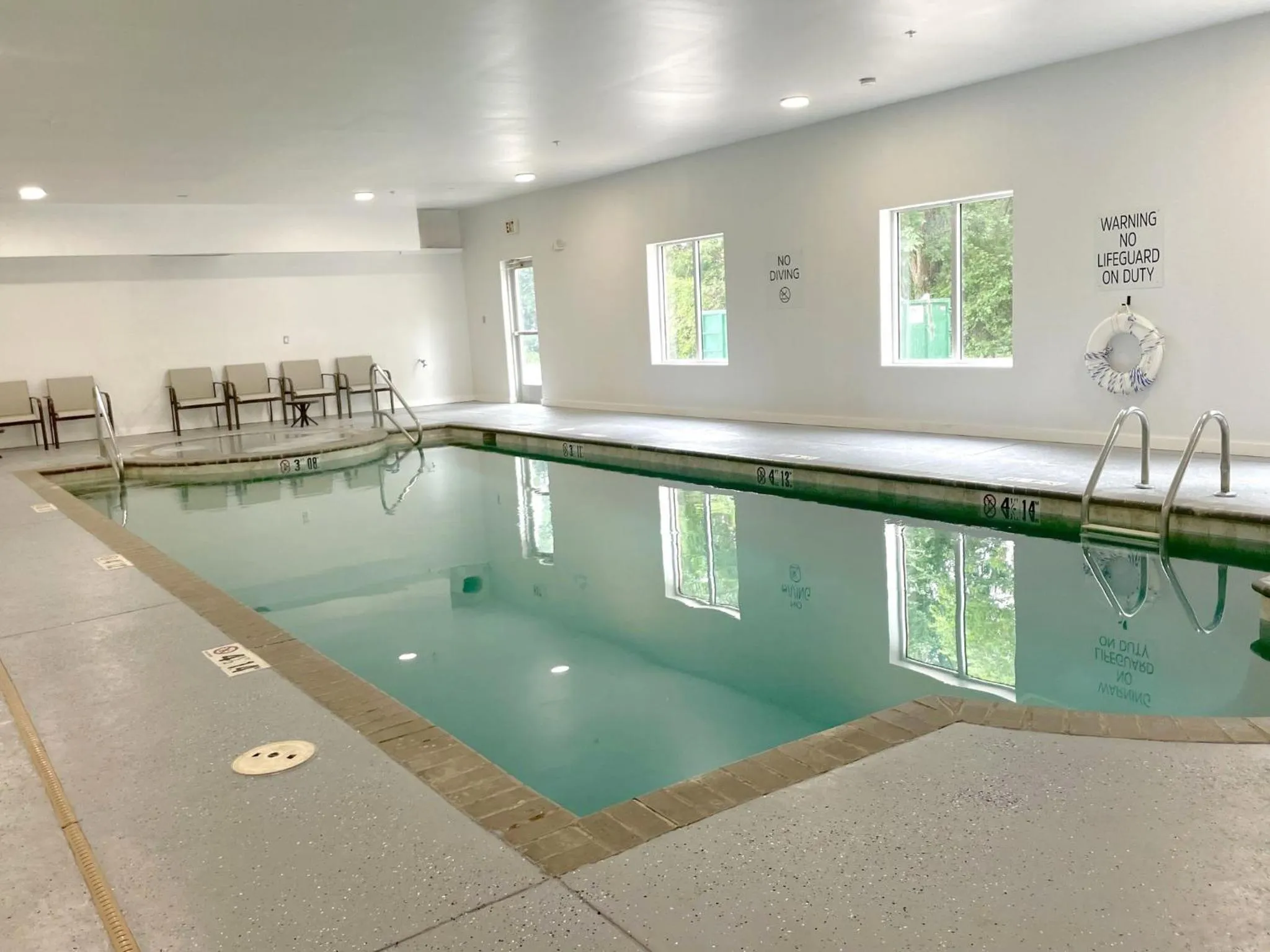 Swimming pool in Holiday Inn Express Topeka North by IHG