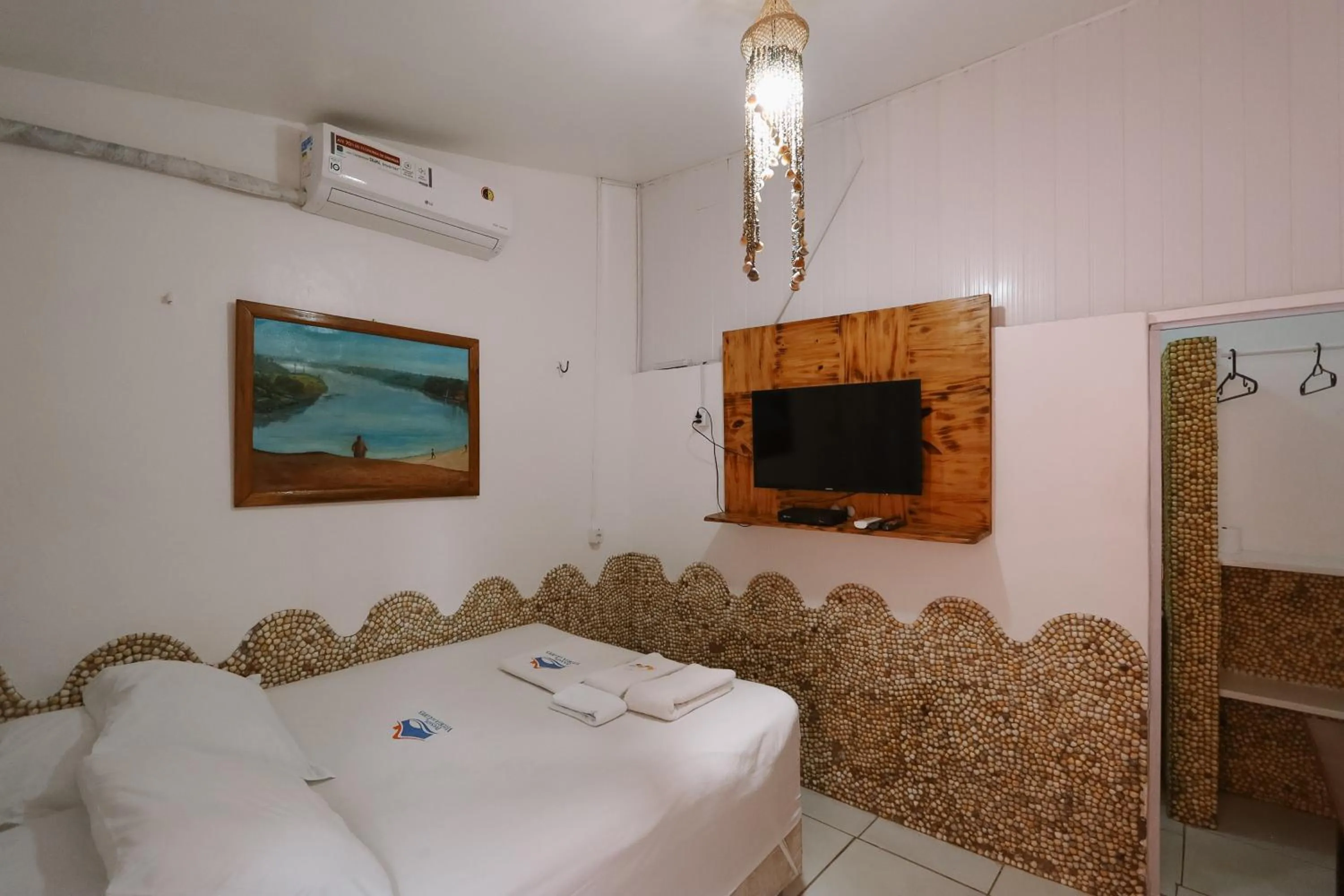 Bed in Pousada Vitória do Lopes