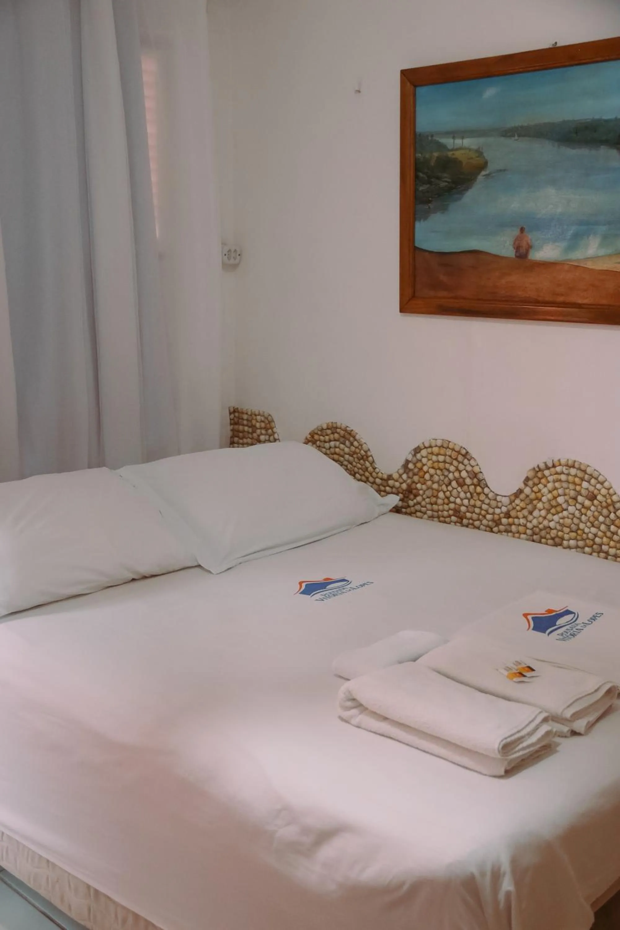 Bed in Pousada Vitória do Lopes