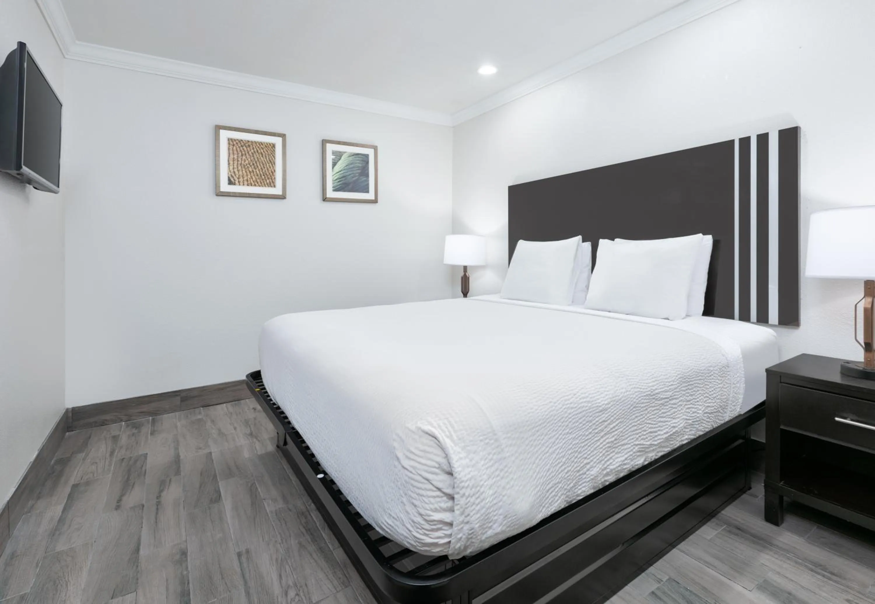 Bed in Ramada by Wyndham Diamondhead I-10 Gulfport