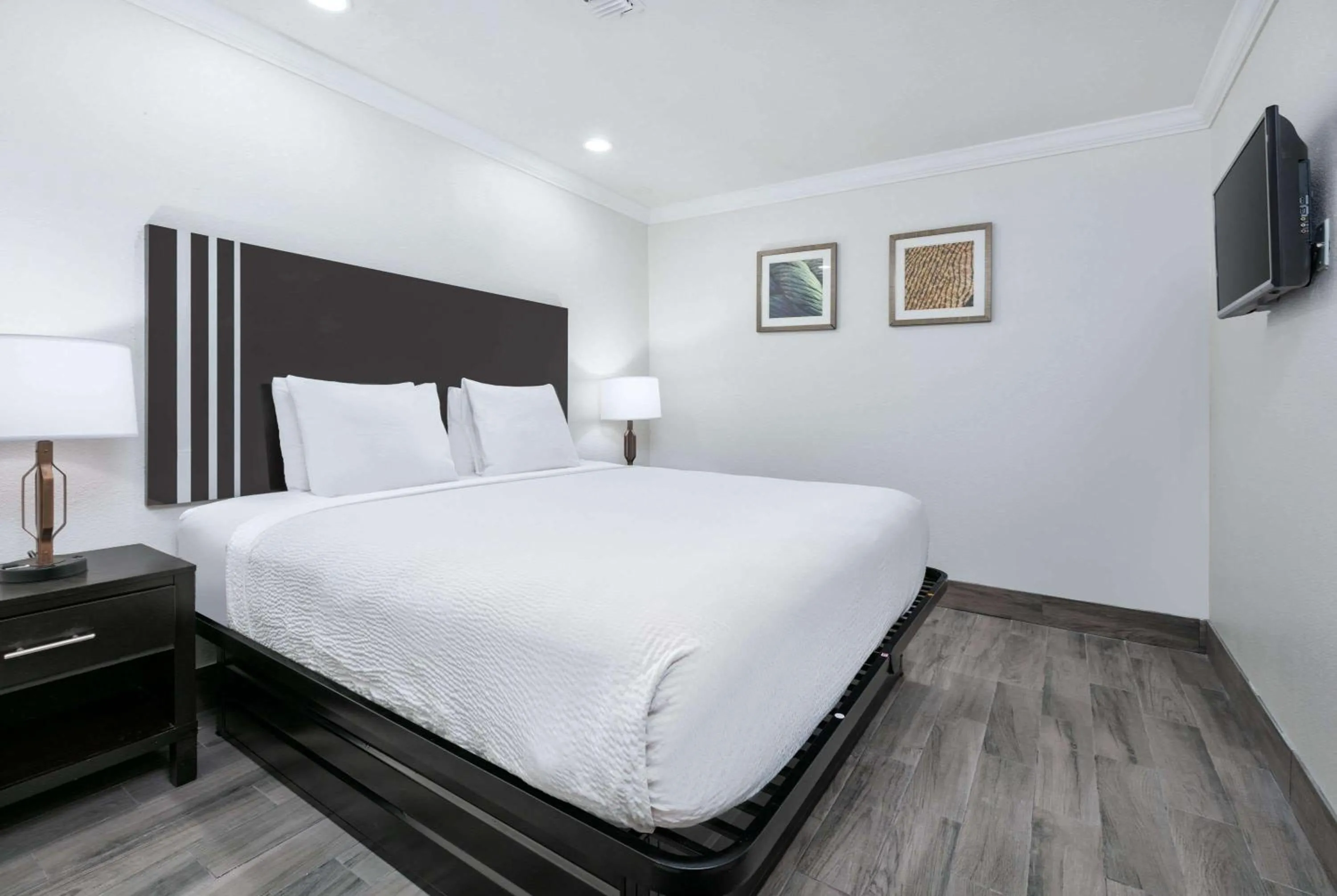 Photo of the whole room, Bed in Ramada by Wyndham Diamondhead I-10 Gulfport