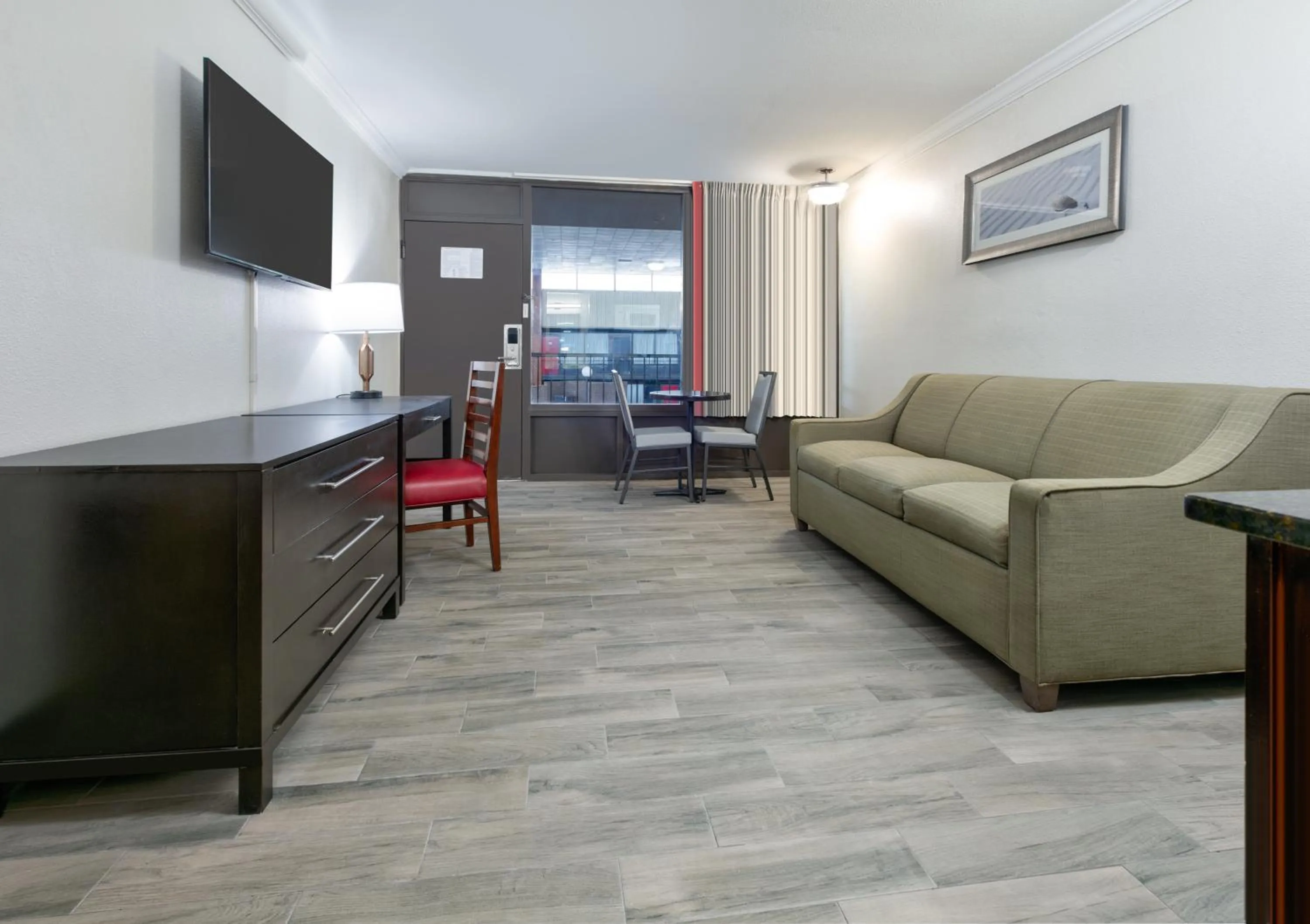 Seating area in Ramada by Wyndham Diamondhead I-10 Gulfport