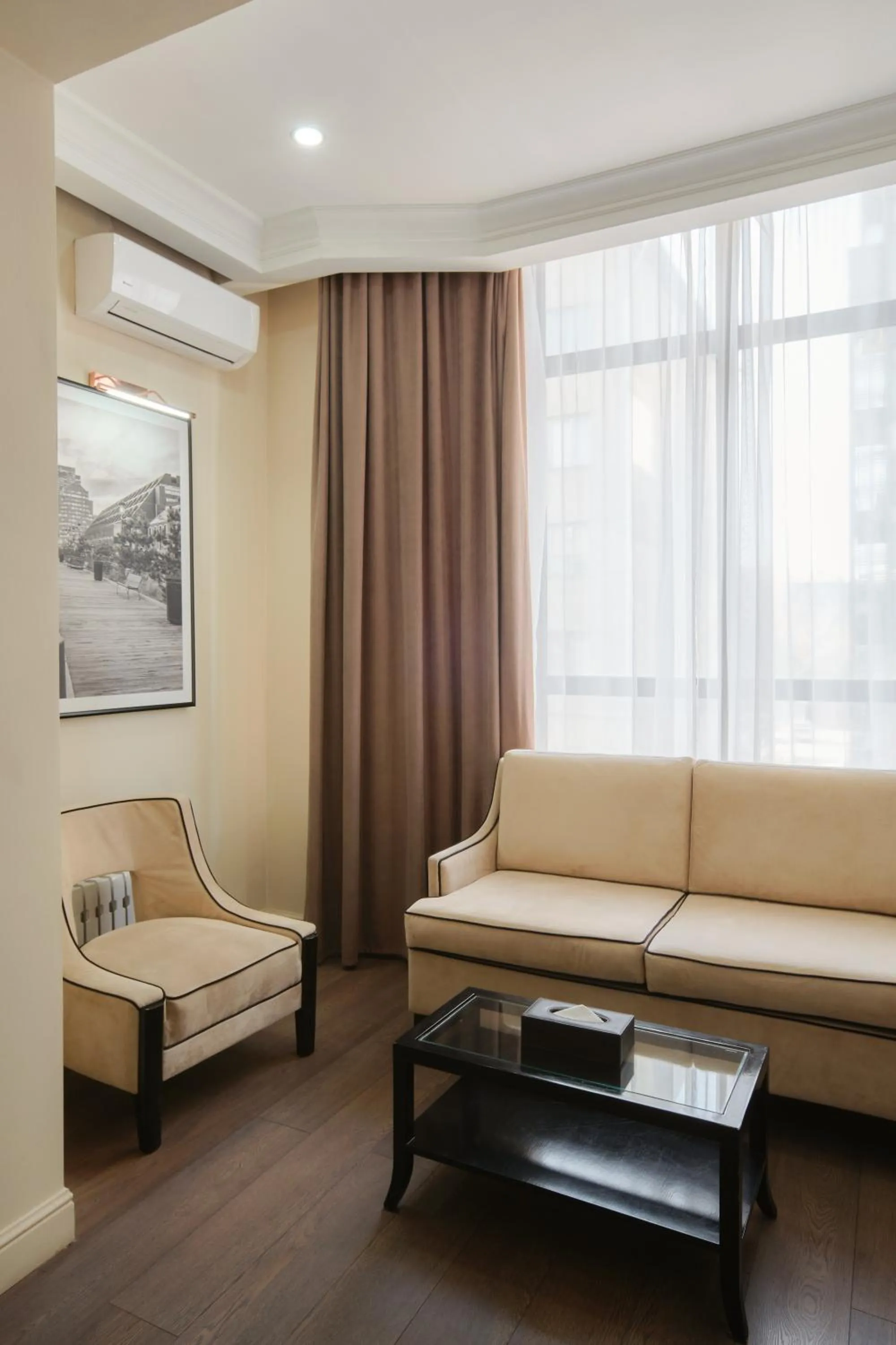 Seating area in Madison Ave Hotel Bishkek