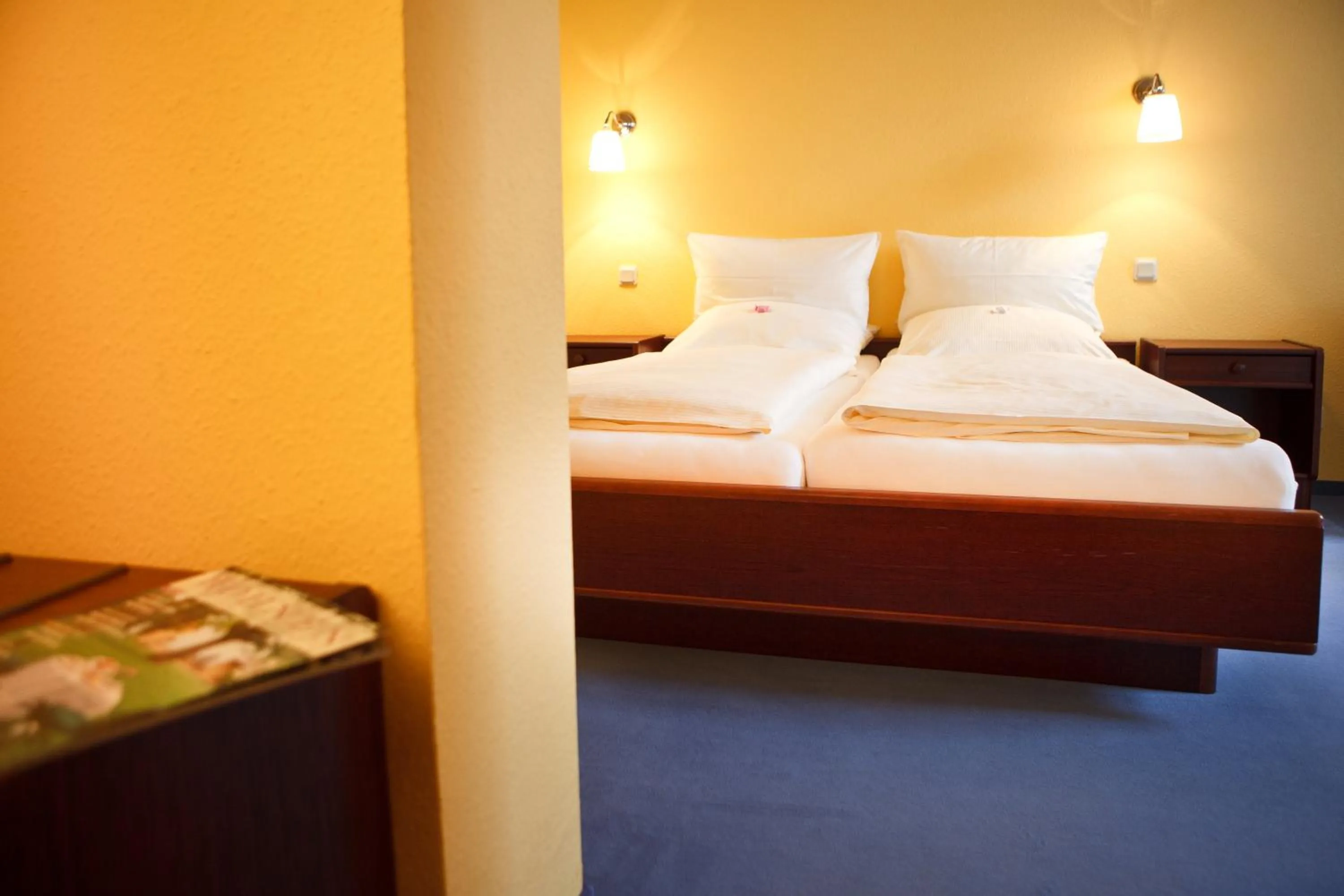 Bed in Landhotel Zum Pottkuchen