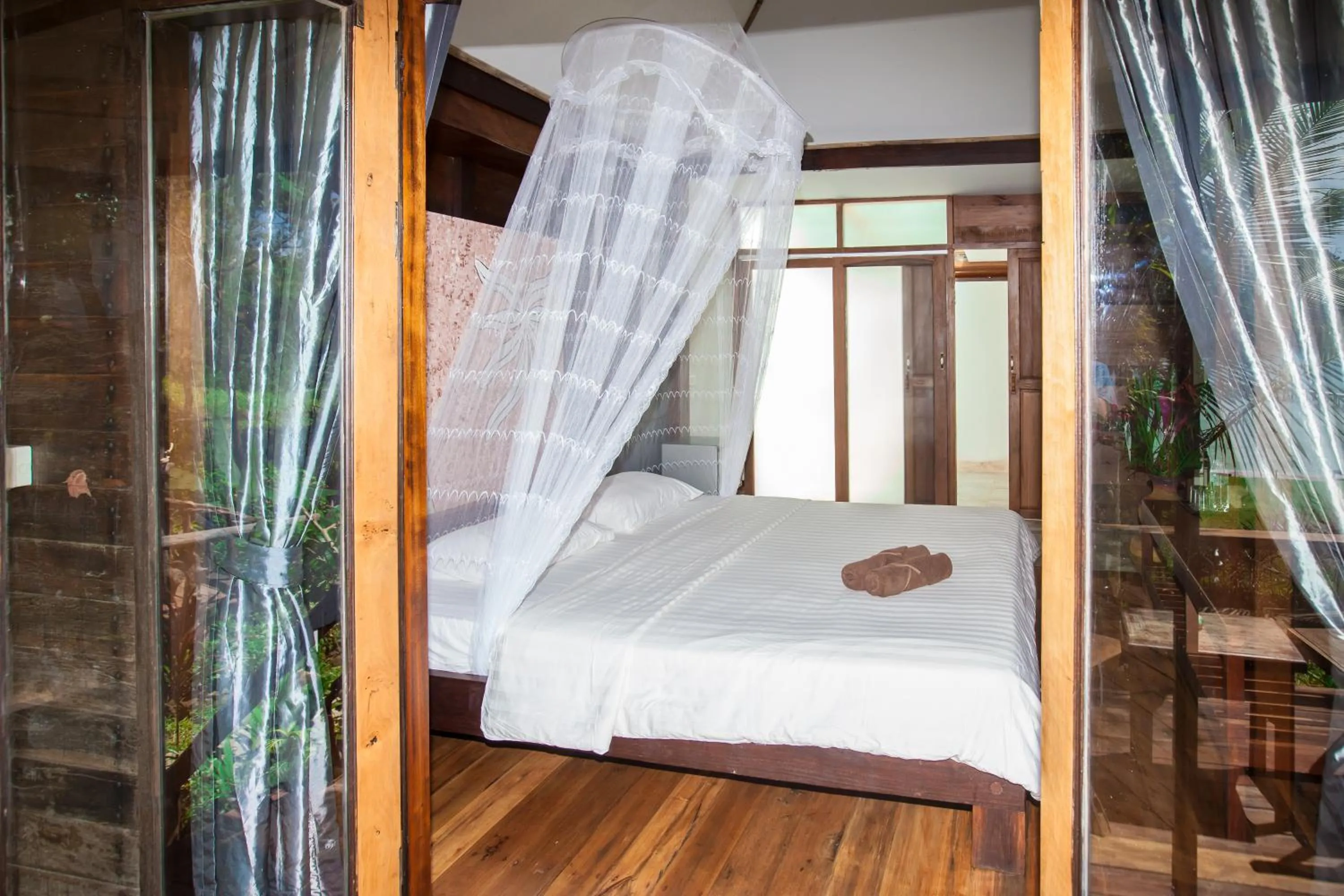 Photo of the whole room, Bed in Koh Kood Resort