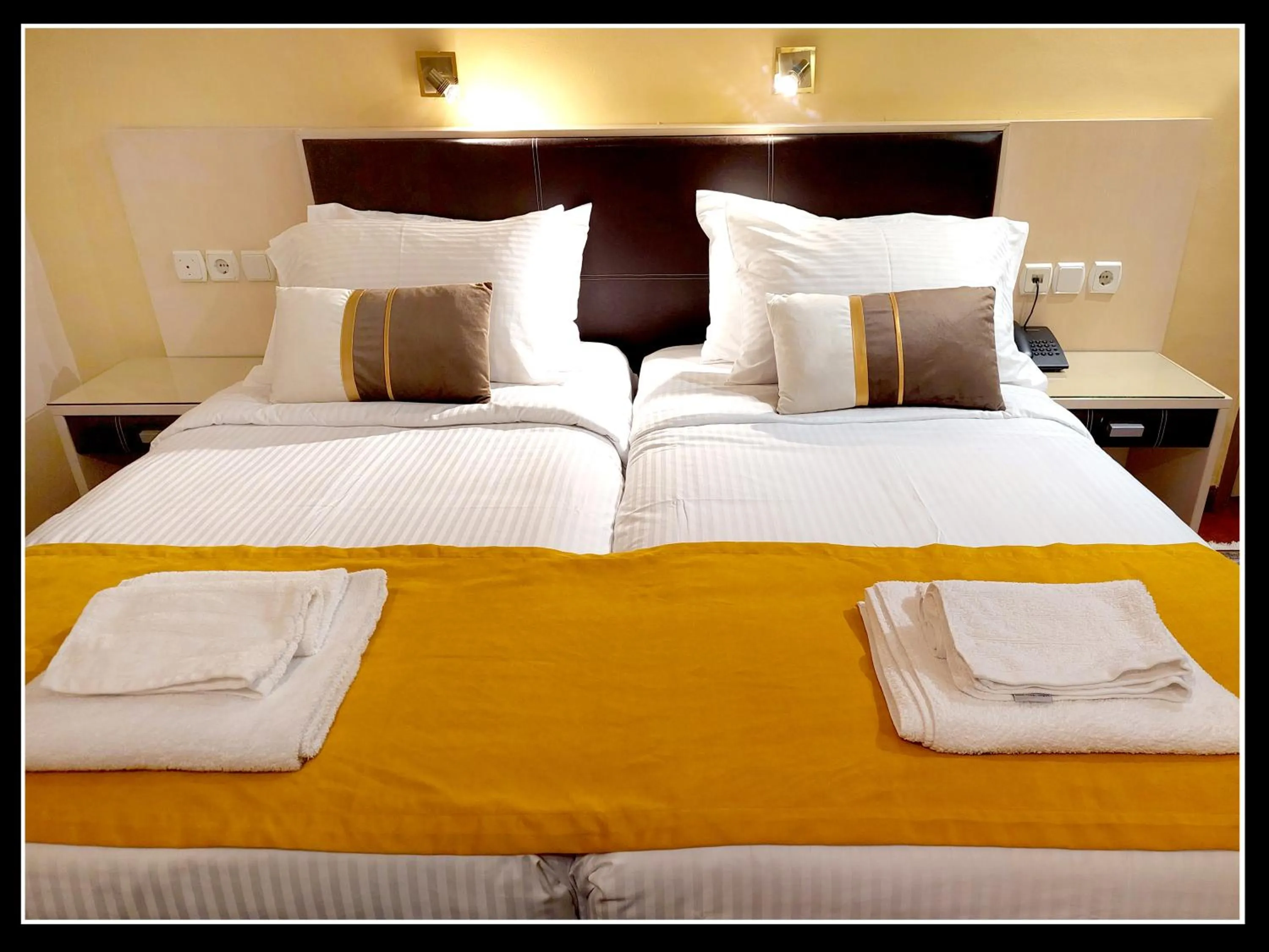 Bed in Lakonia Hotel