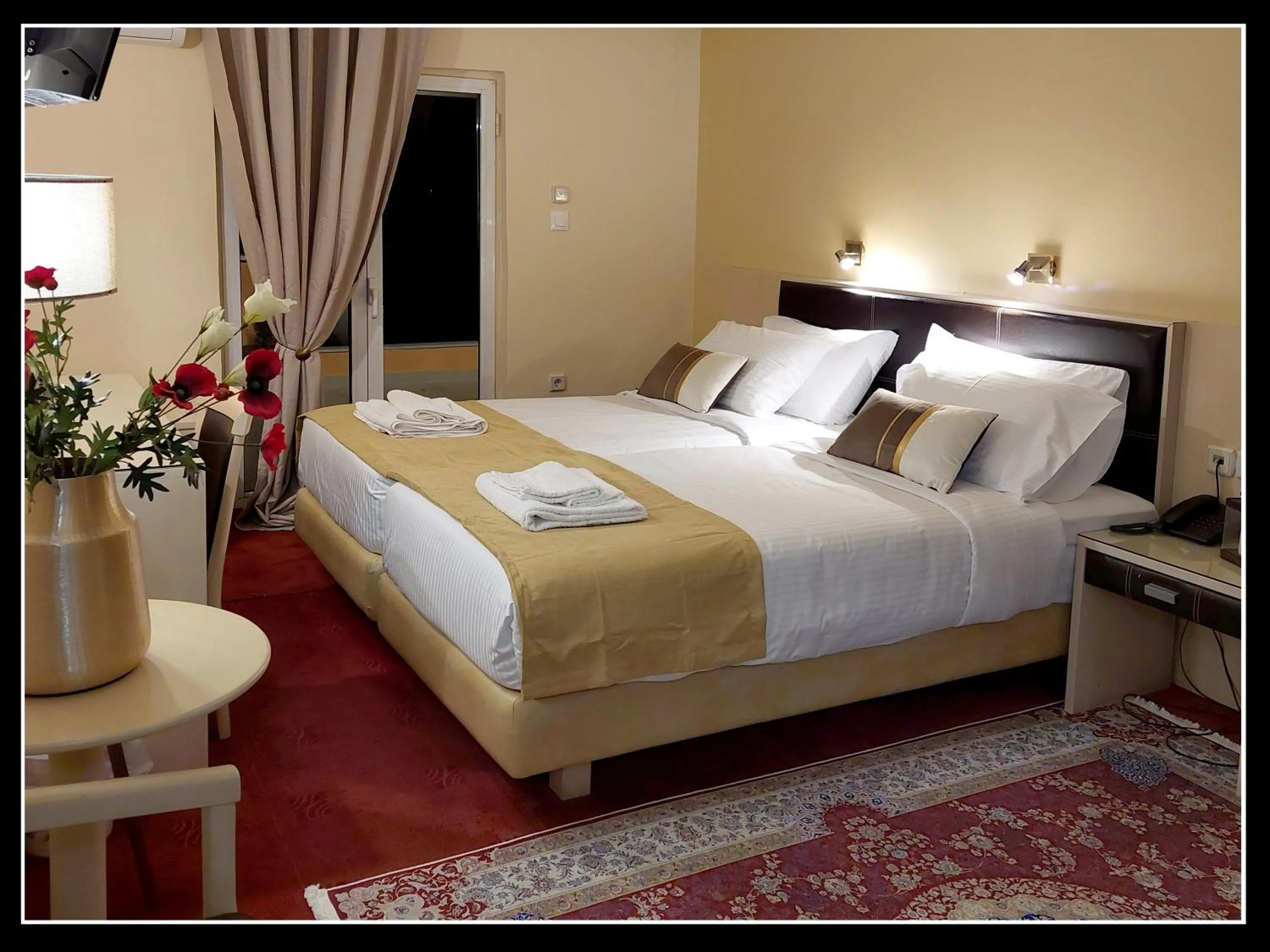 Bed in Lakonia Hotel
