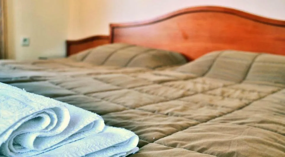 Bed in Lakonia Hotel