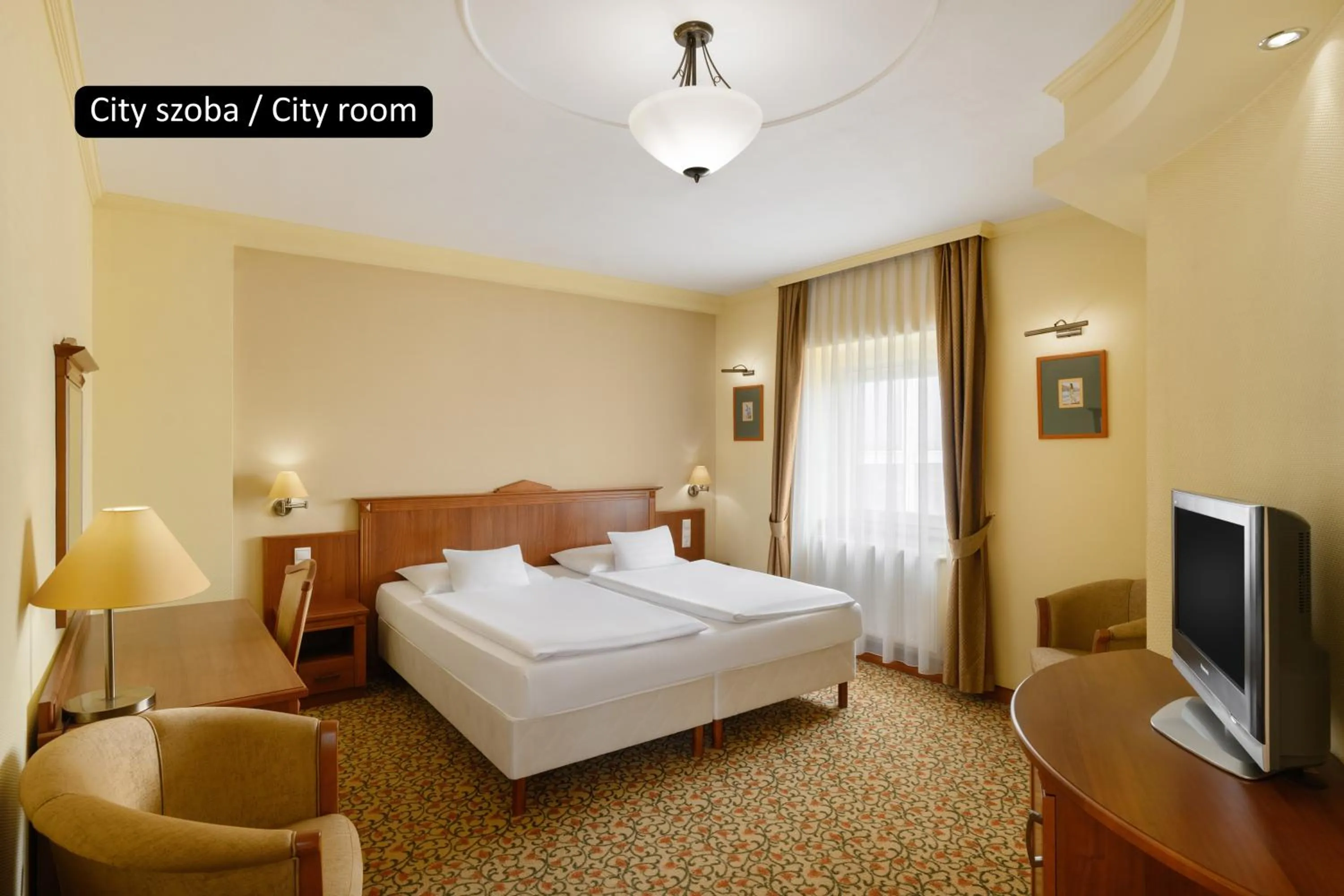 Bed in Aranyhomok Hotel Business & Relax